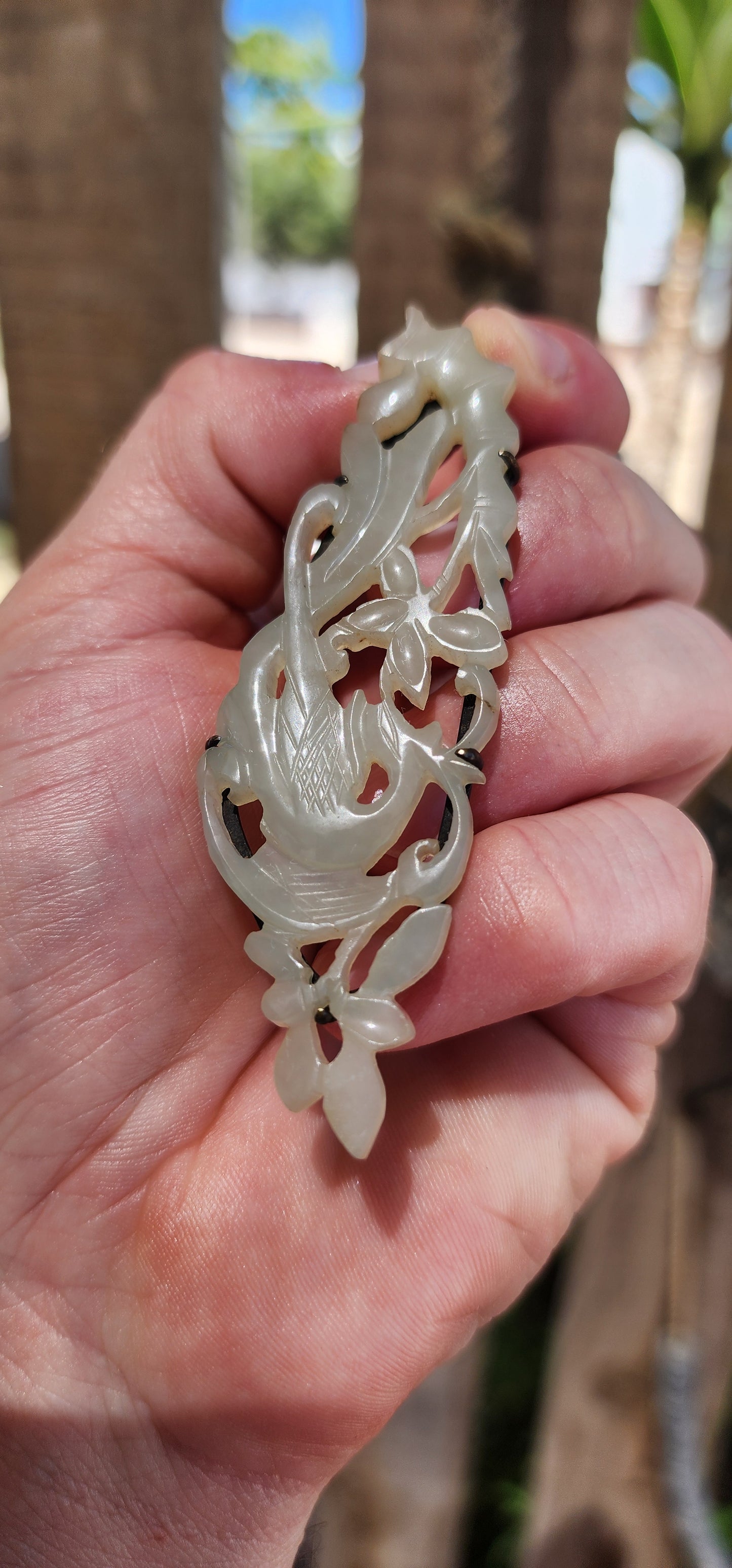 A truly soulful treasure from Imperial China, this generously sized pendant is exquisitely hand-carved from pale celadon Hetian (Hotan) jade and dates to the Qing Dynasty (circa mid–late 19th century, approx. 1800s).