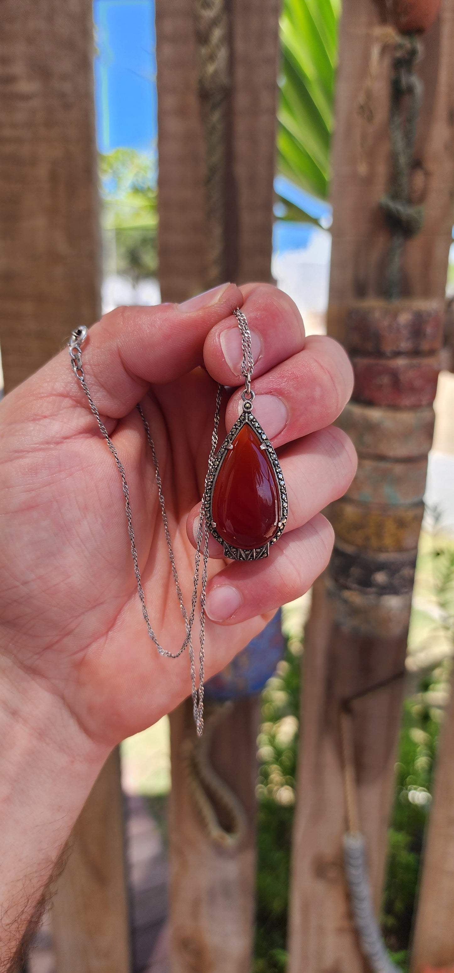 A truly fantastic and highly sought-after Art Deco treasure, this exquisite pendant dates to the circa 1920s and captures everything we adore about the Deco era — bold geometry, elegant symmetry, and rich materials.