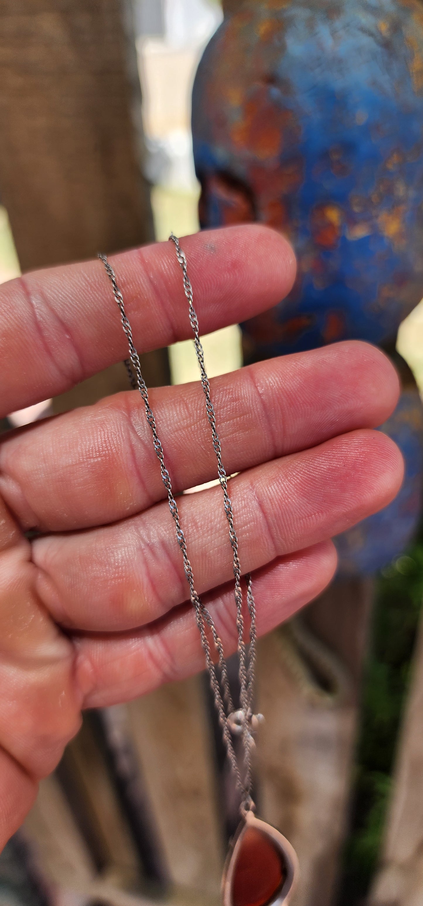 A truly fantastic and highly sought-after Art Deco treasure, this exquisite pendant dates to the circa 1920s and captures everything we adore about the Deco era — bold geometry, elegant symmetry, and rich materials.