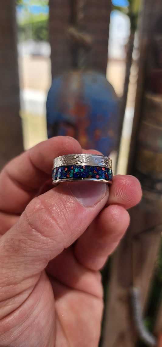 An artisan-made, one-of-a-kind statement ring crafted from an authentic Queen Elizabeth II Half Crown nickel coin — turning historical currency into rugged, wearable art.