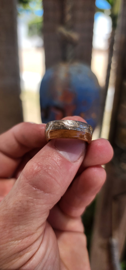 A ring with real history and natural soul — crafted from an authentic Queen Elizabeth II Half Crown nickel coin, transformed into a bold unisex band with serious character.