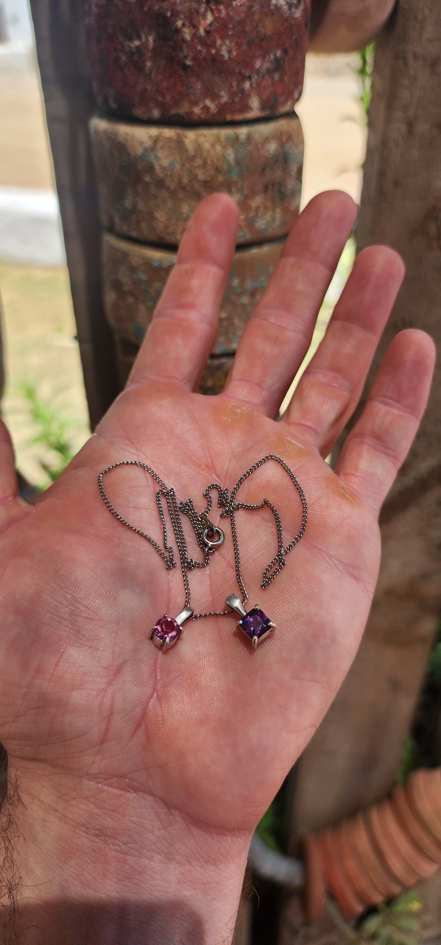 Double the charm, double the sparkle! This playful little beauty features two minimalist sterling silver pendants suspended together on a fine sterling silver chain.