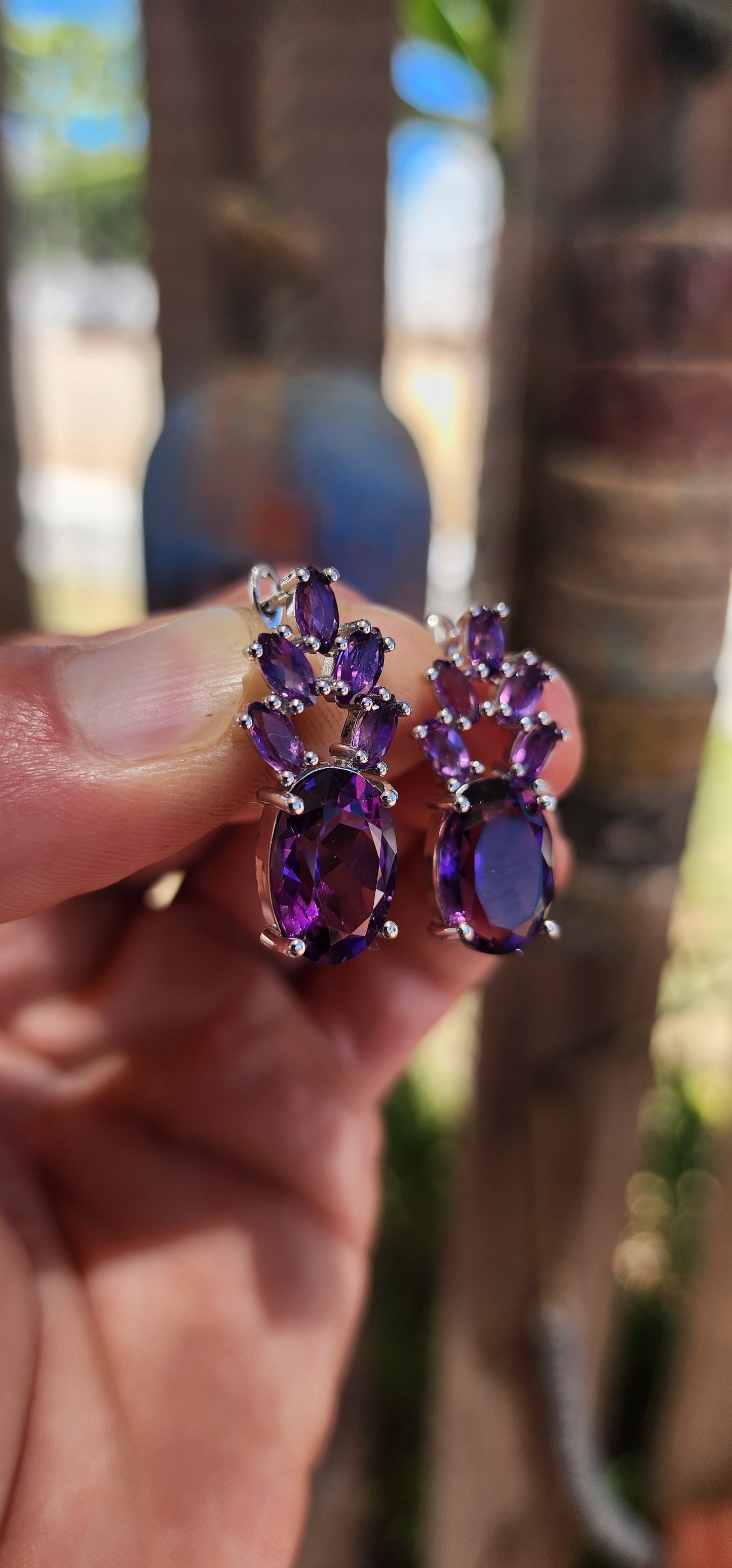 These jaw-dropping sterling silver statement earrings are like amethyst bouquets blooming right from your lobes — regal, sparkly, and dripping in violet luxury.
