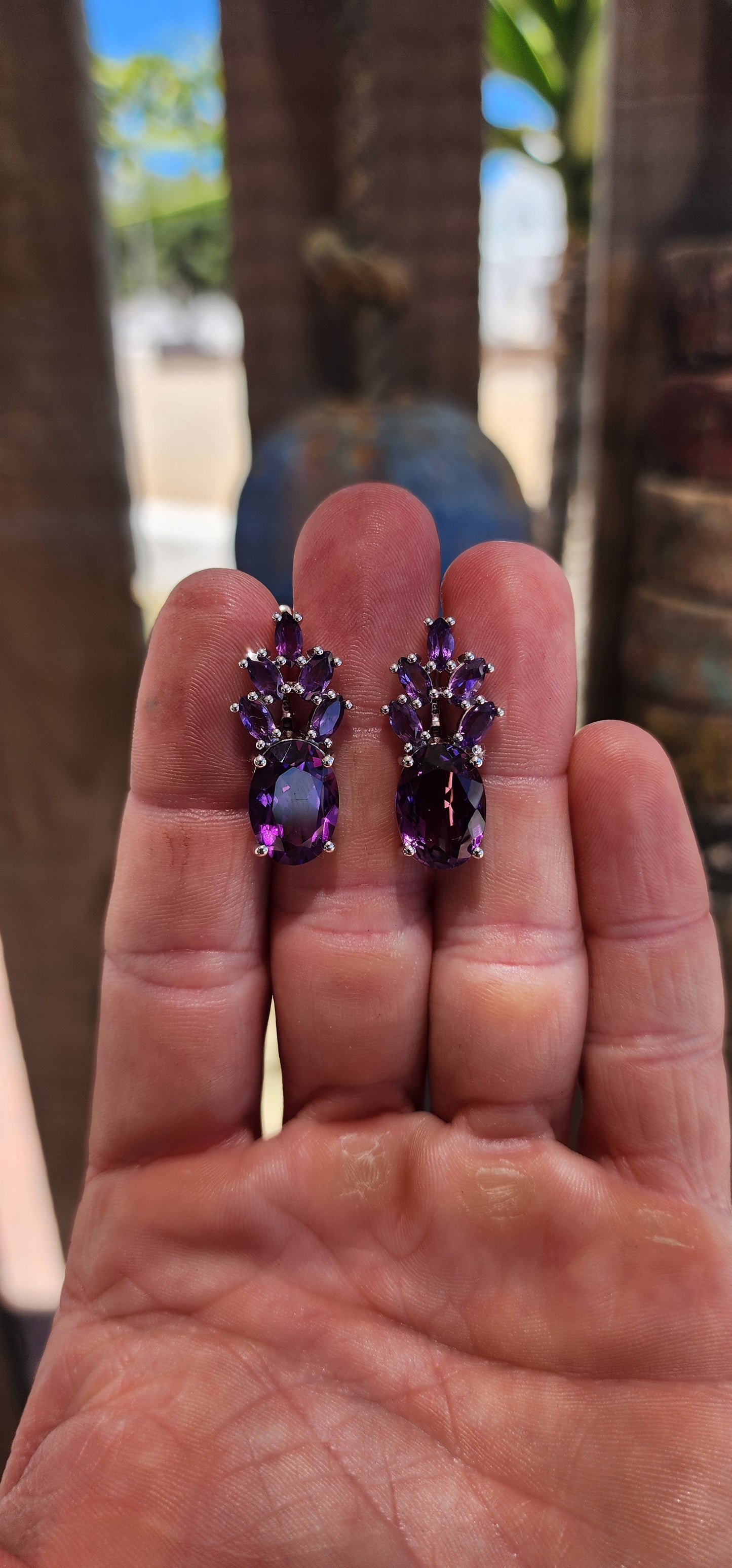 These jaw-dropping sterling silver statement earrings are like amethyst bouquets blooming right from your lobes — regal, sparkly, and dripping in violet luxury.