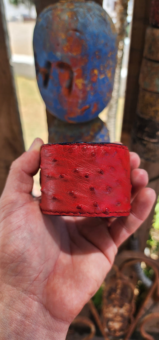 This high-quality artisan-made cuff is crafted from genuine ostrich leather in the most delicious rich red shade — a colour that instantly commands attention.