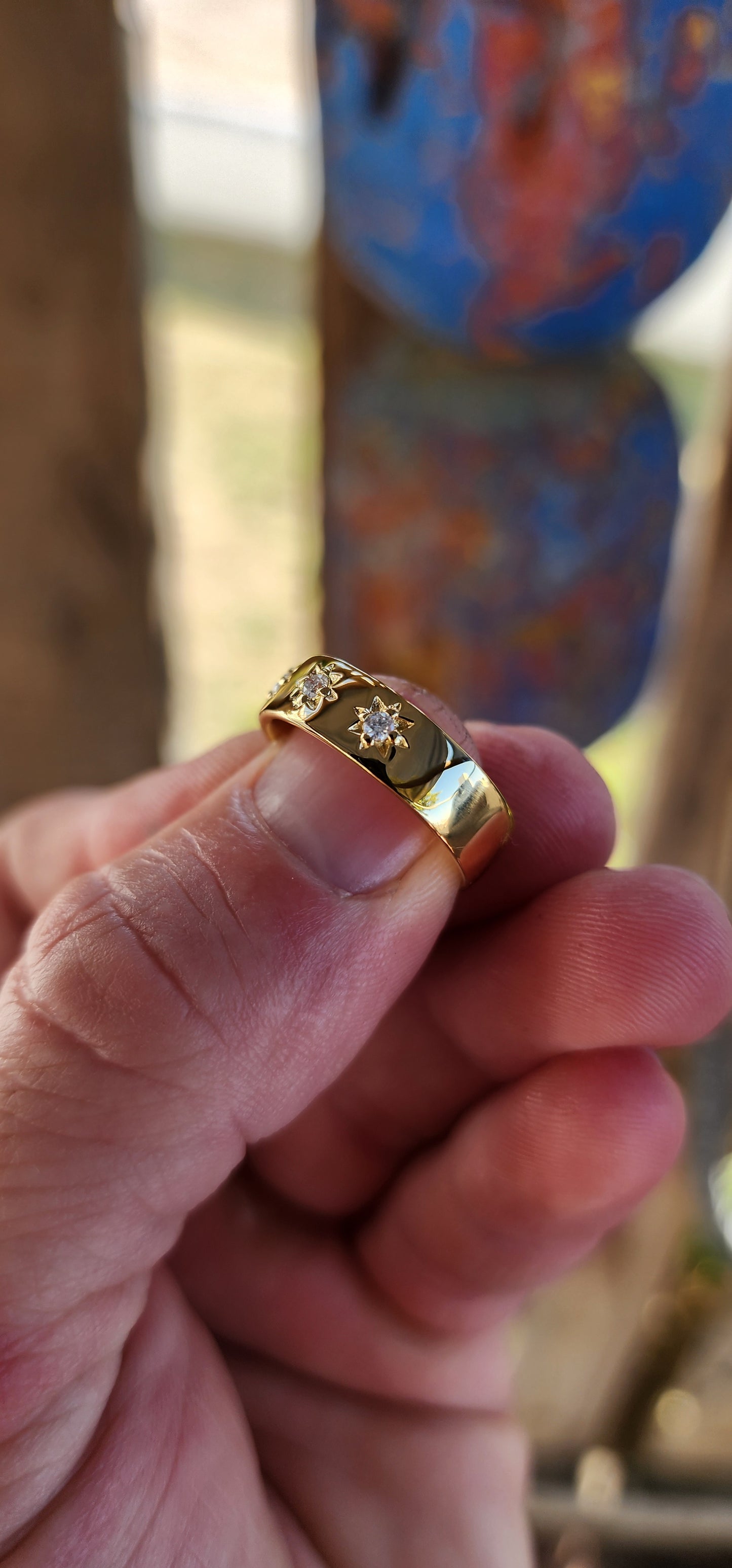 This striking unisex Victorian-revival diamond gypsy ring is crafted in solid sterling silver and finished in a rich, buttery layer of 18ct yellow gold plating, giving the band a glowing, antique-gold warmth that feels both classic and enduring.