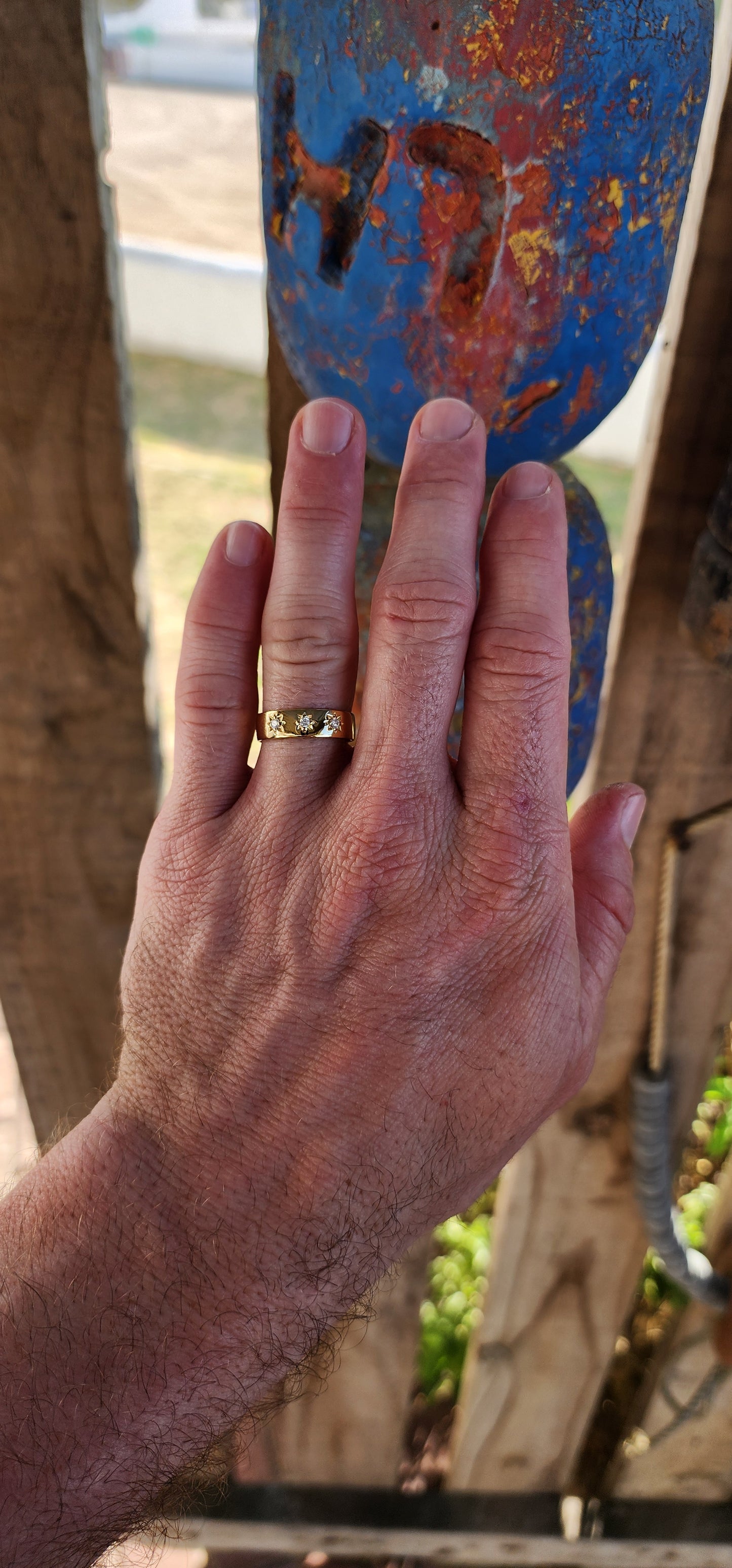 This striking unisex Victorian-revival diamond gypsy ring is crafted in solid sterling silver and finished in a rich, buttery layer of 18ct yellow gold plating, giving the band a glowing, antique-gold warmth that feels both classic and enduring.