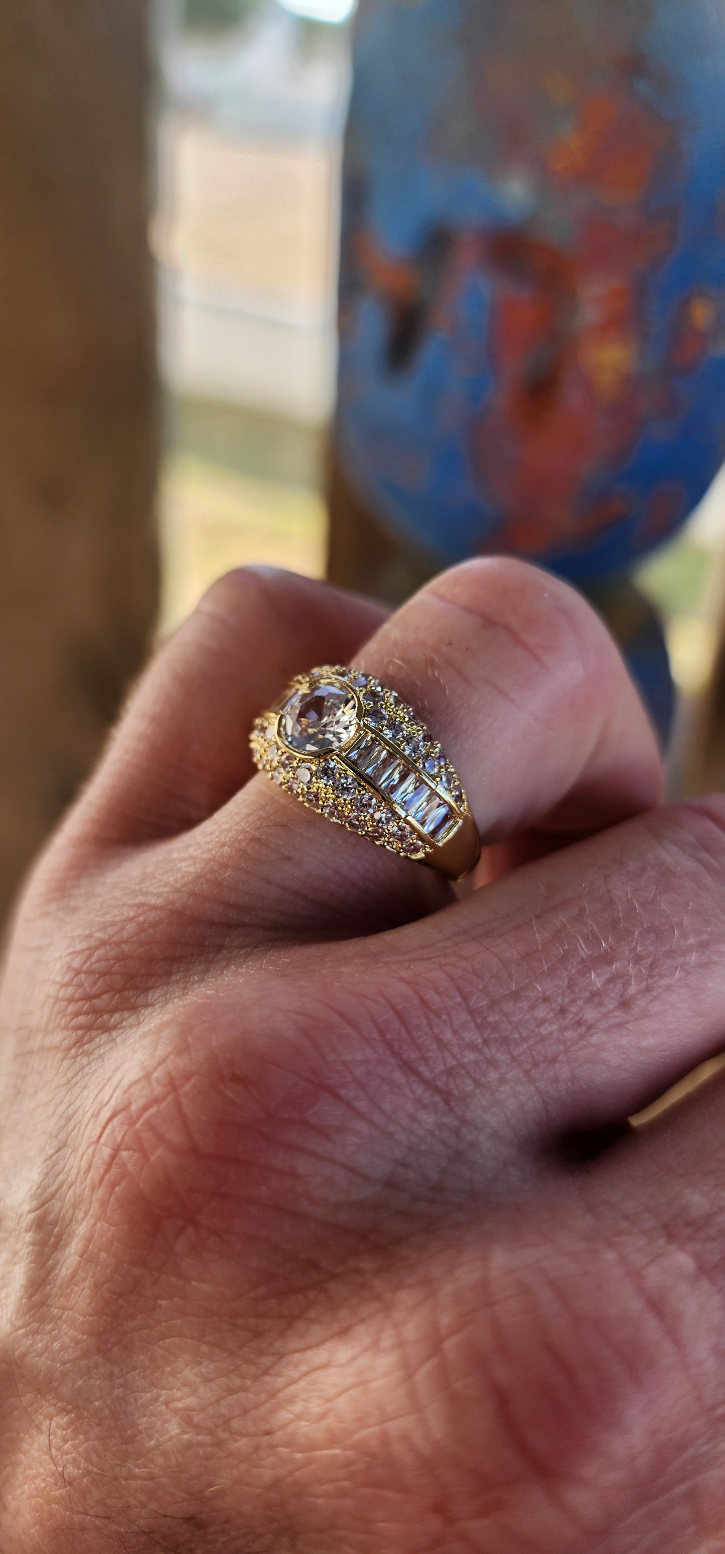 Classical, elegant, and unapologetically glamorous — this stunning sterling silver dress ring has been luxuriously finished in 18ct yellow gold plating, giving it that rich, high-end golden glow.