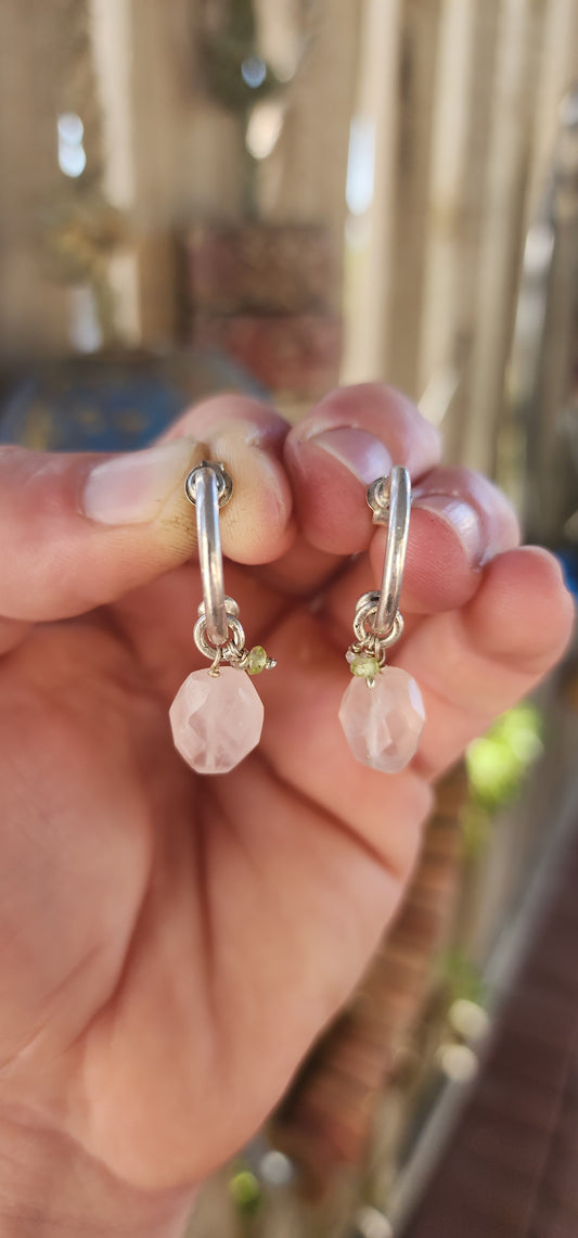A gorgeous artisan-made pair of sterling silver half-hoop / huggie style earrings, designed with a clean modern silhouette and the sweetest little gemstone charm dangles.