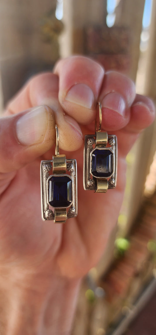 Absolutely stunning Art Deco revival earrings — a bold little masterpiece of geometry, contrast, and deep gemstone glamour.