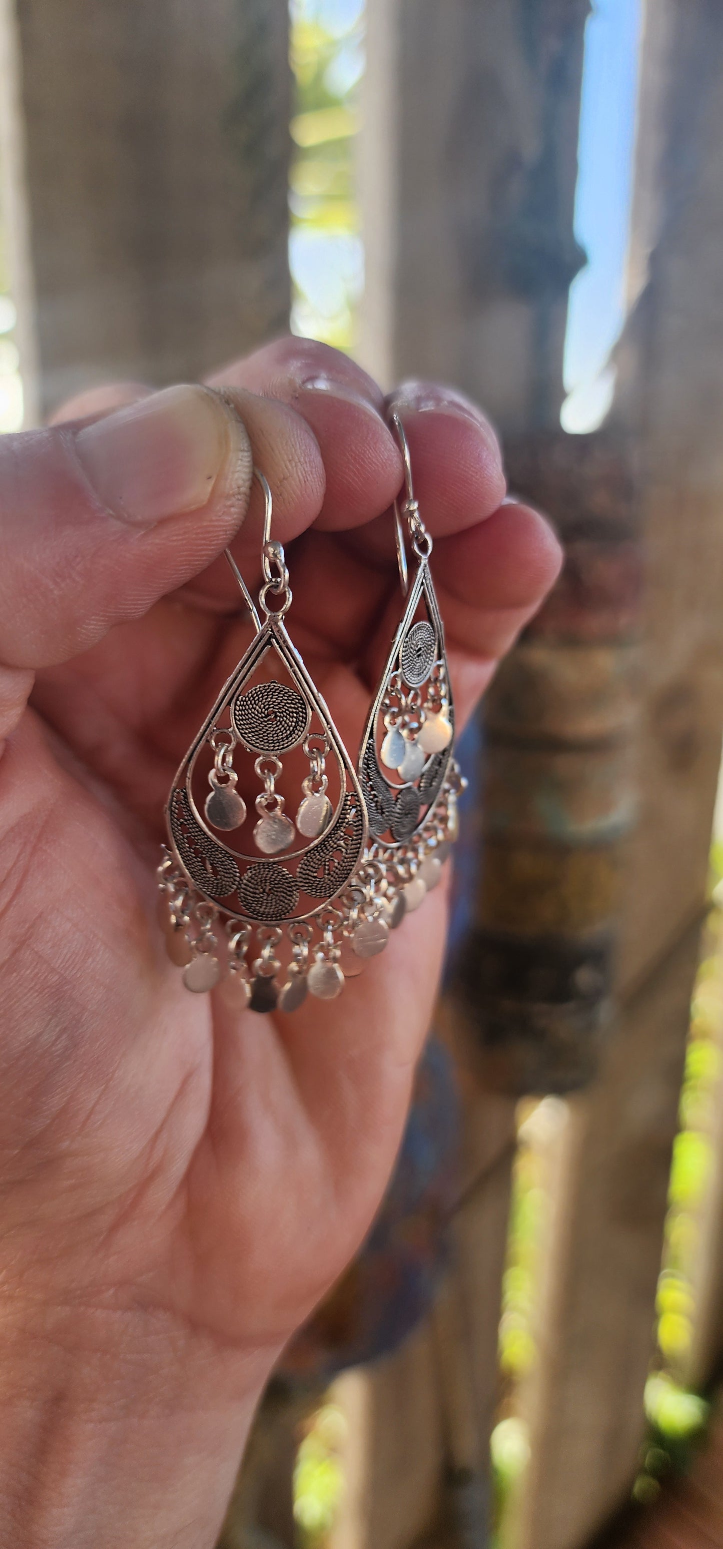 A dreamy pair of vintage ethnic-inspired bohemian sterling silver drop earrings — light, musical and full of that wanderlust gypsy energy.