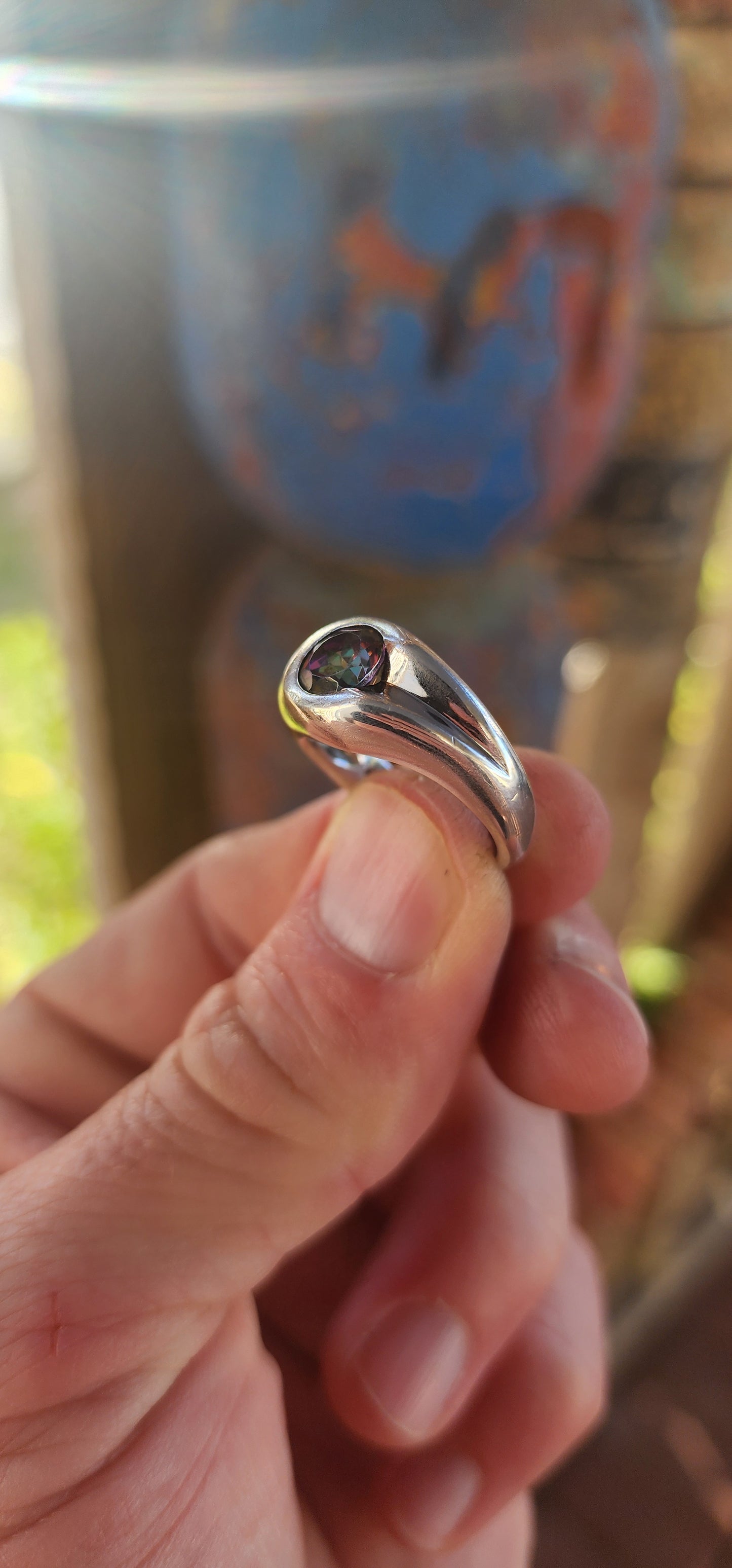 This handmade sterling silver ring is modernist cool — a smooth, weighty band with a bold, flowing silhouette.