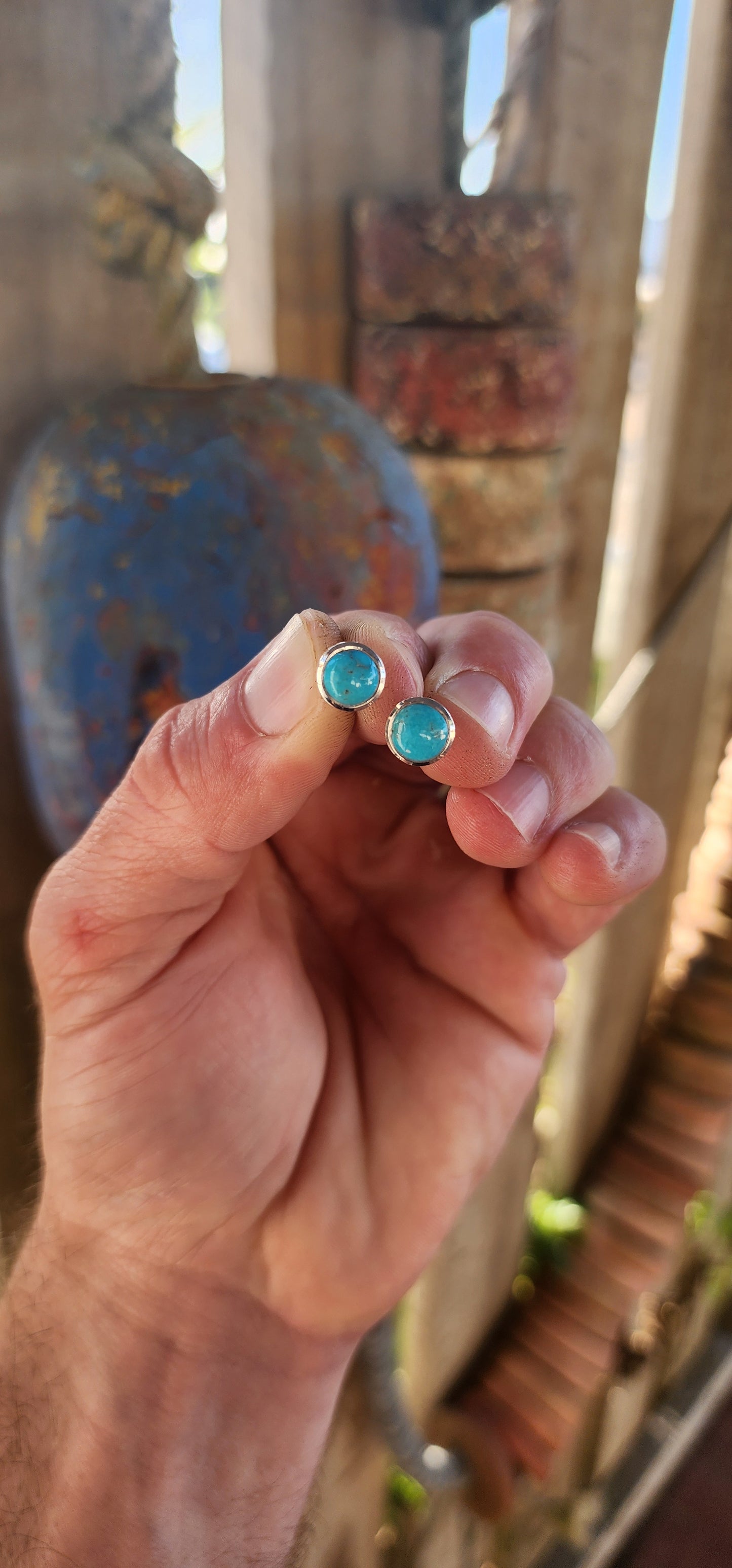 These gorgeous unisex sterling silver stud earrings feature perfectly round turquoise cabochons, beautifully tube / bezel set in sleek polished sterling silver.