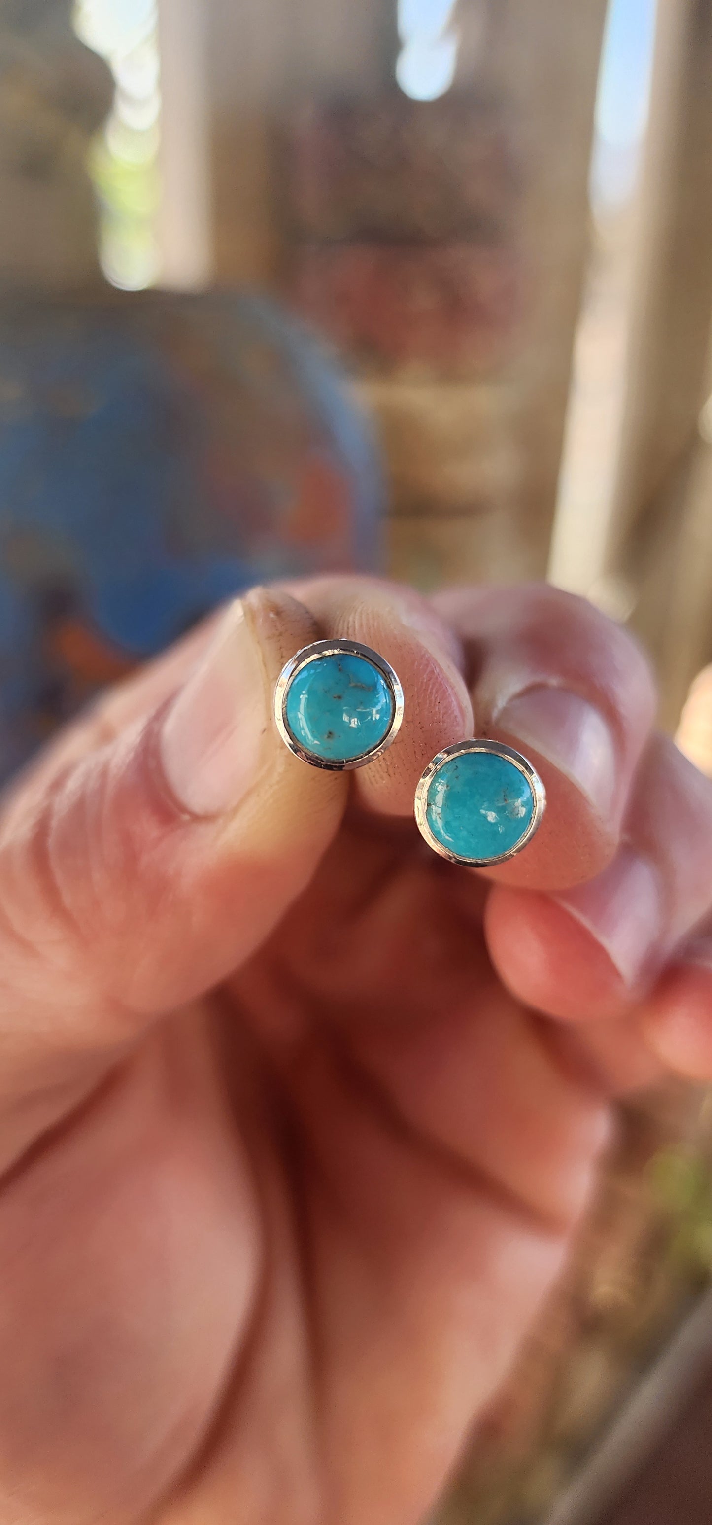 These gorgeous unisex sterling silver stud earrings feature perfectly round turquoise cabochons, beautifully tube / bezel set in sleek polished sterling silver.