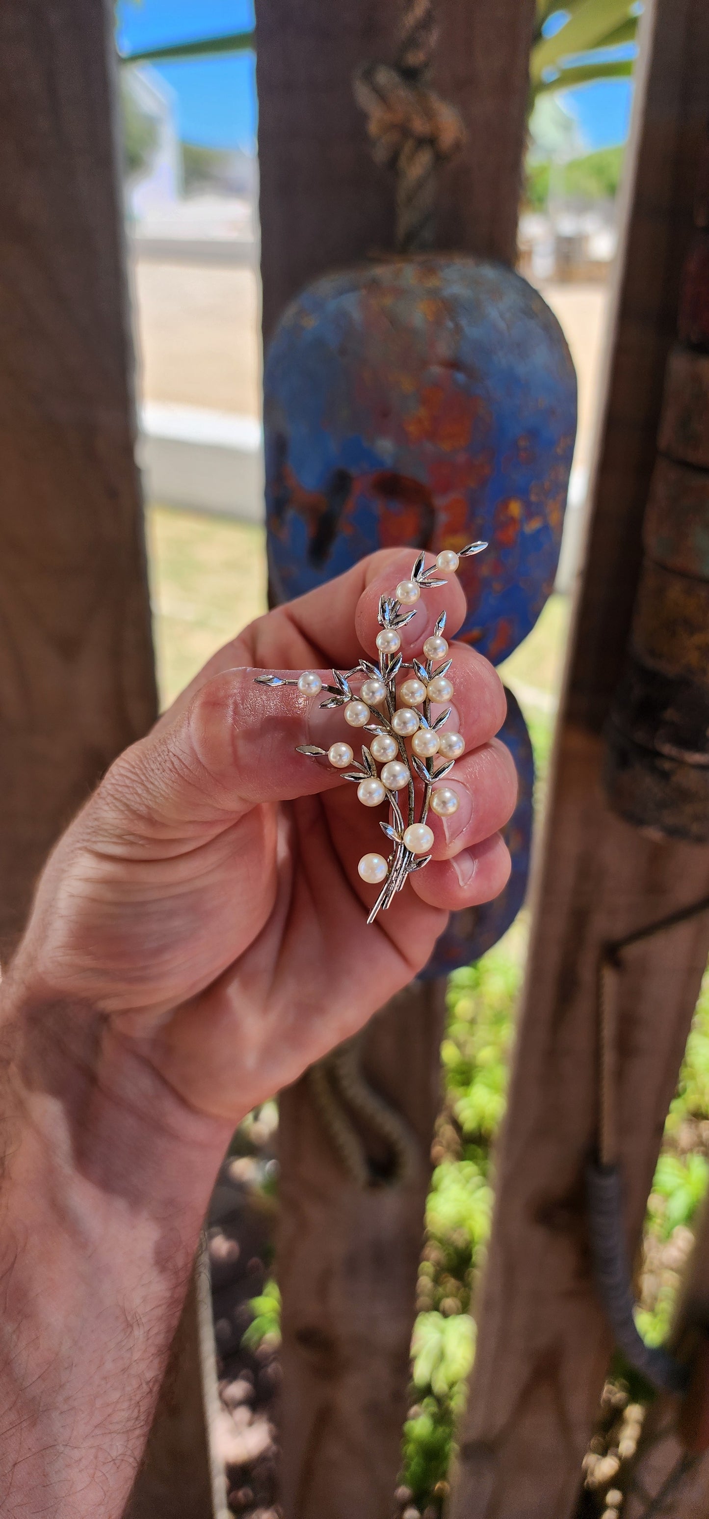 A marvelous and generously sized 1950’s pearl spray brooch crafted in sterling silver and set with beautiful Japanese Akoya cultured pearls.