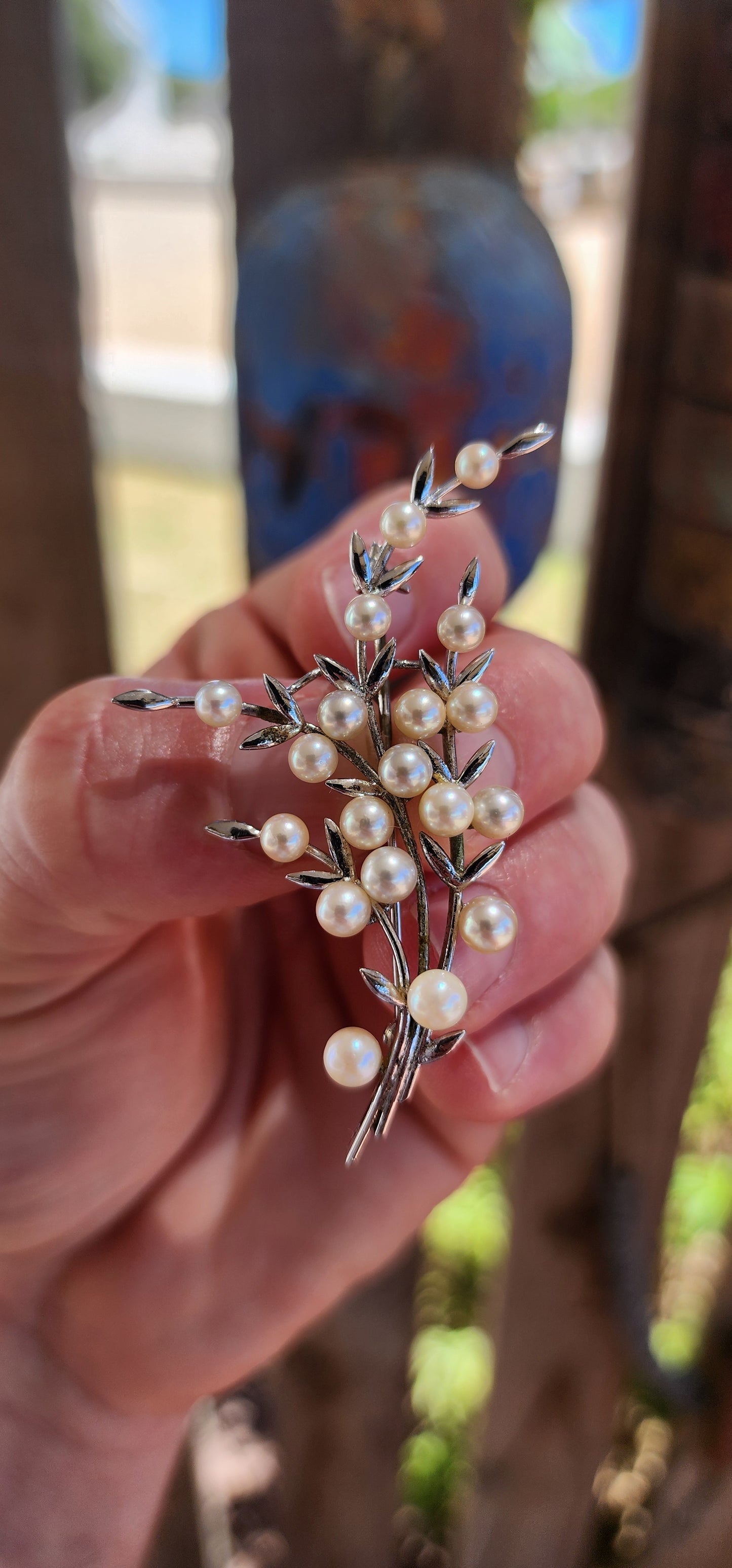 A marvelous and generously sized 1950’s pearl spray brooch crafted in sterling silver and set with beautiful Japanese Akoya cultured pearls.