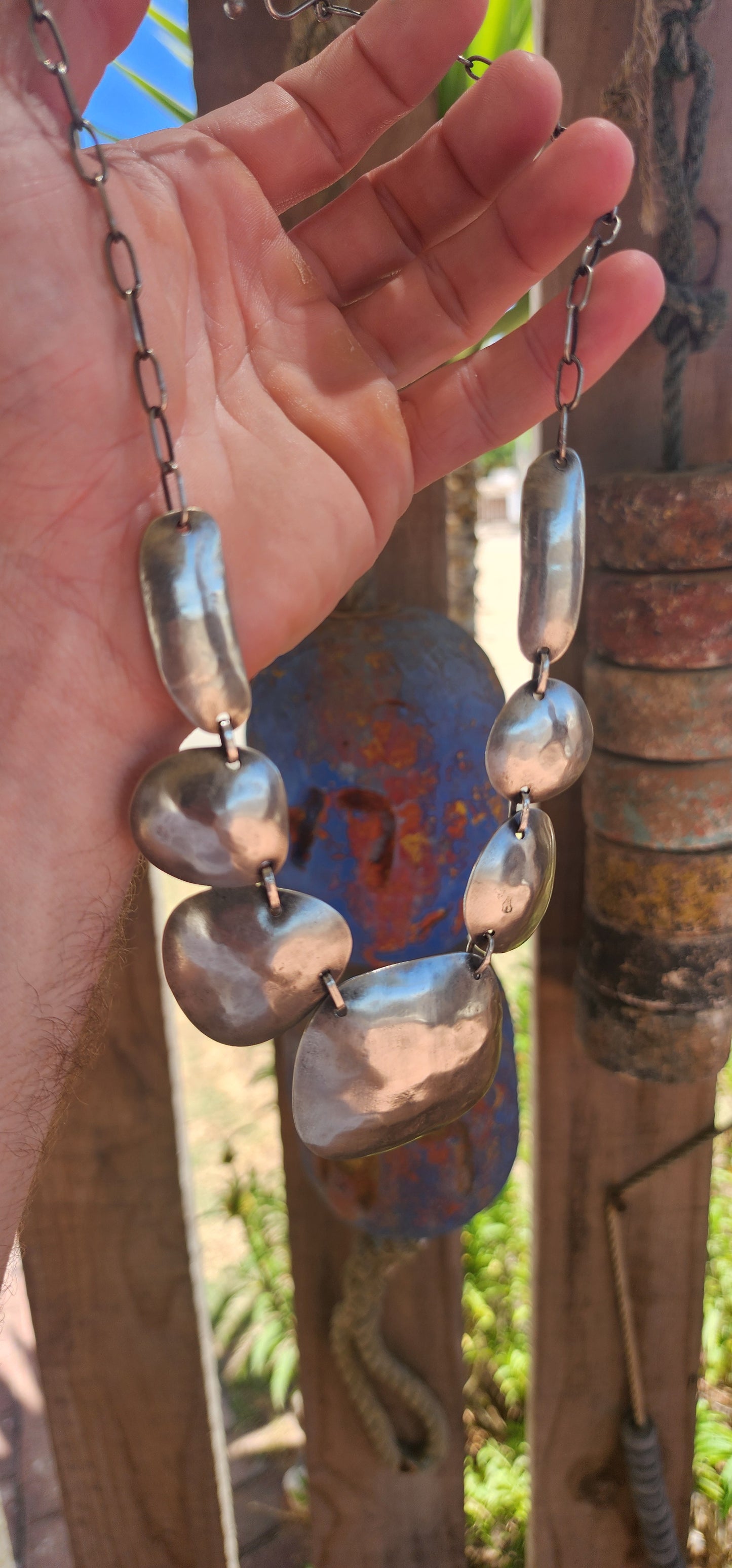 This powerful statement necklace carries the soul of traditional tribal adornment fused with sculptural modernist design.