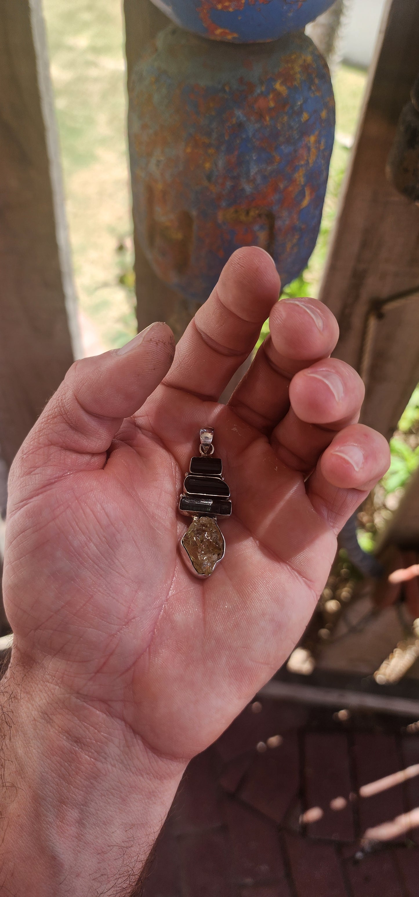 Earthy. Elemental. One-of-a-kind energy. This generously sized handmade pendant is crafted in solid sterling silver and showcases the untamed beauty of raw gemstone specimens.