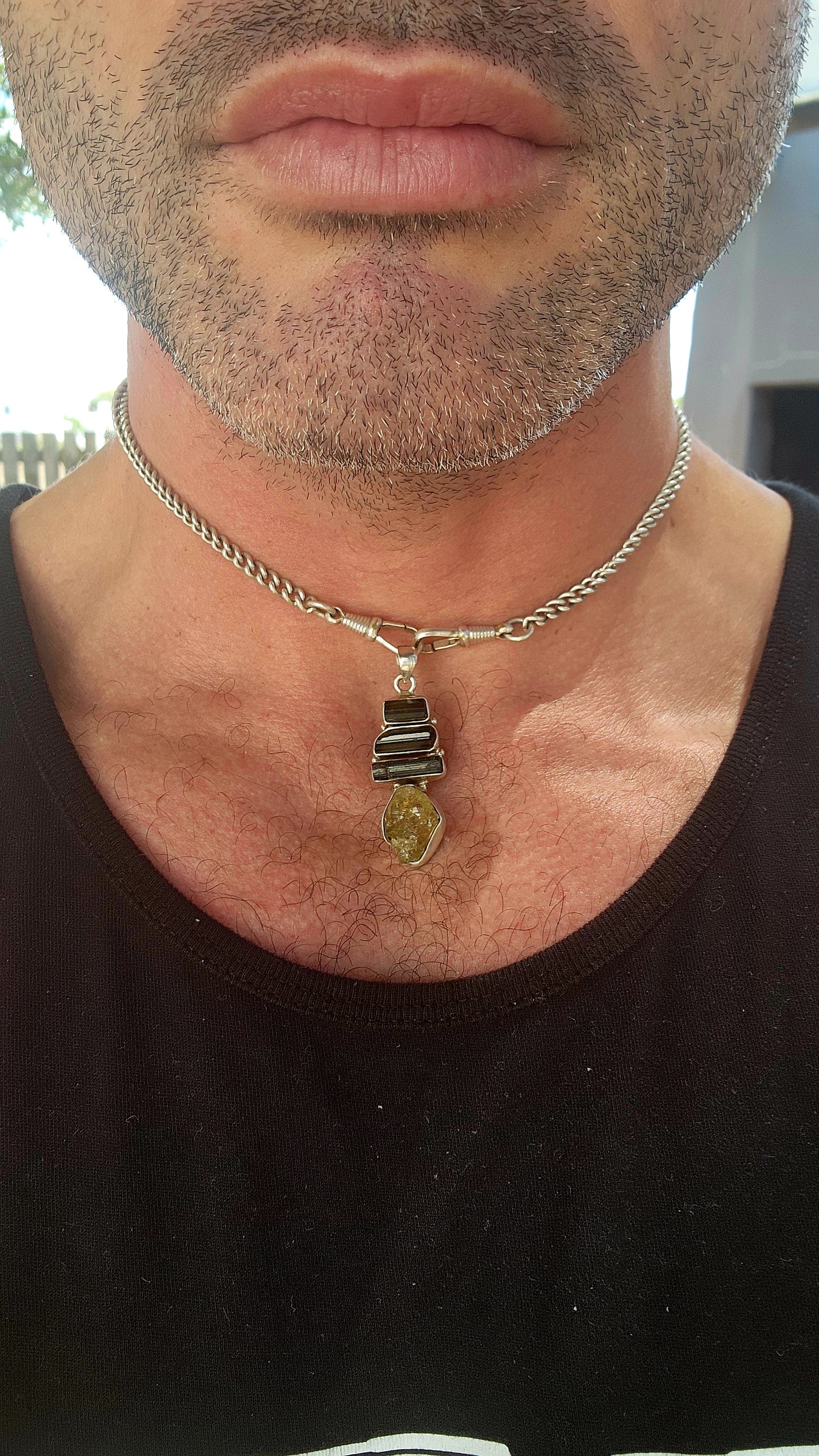 Earthy. Elemental. One-of-a-kind energy. This generously sized handmade pendant is crafted in solid sterling silver and showcases the untamed beauty of raw gemstone specimens.