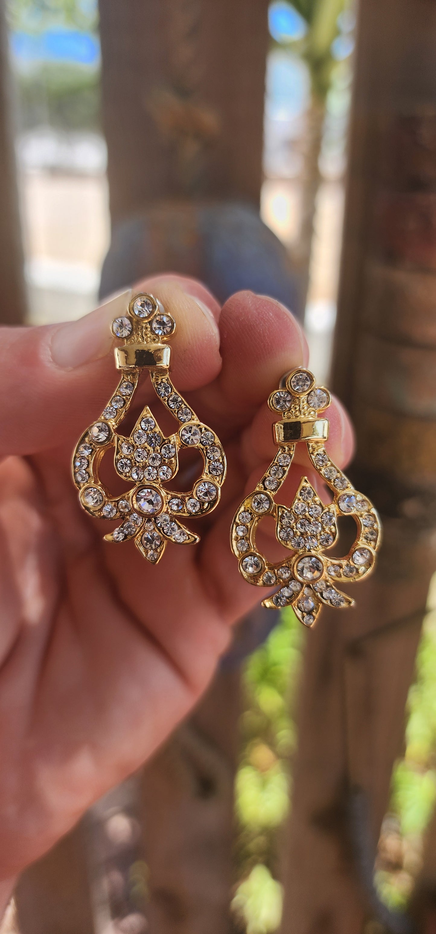 A beautiful pair of vintage costume designer earrings by Dick & Co., known for producing elegant, high-quality costume jewellery pieces with a strong focus on sparkle and m design.
