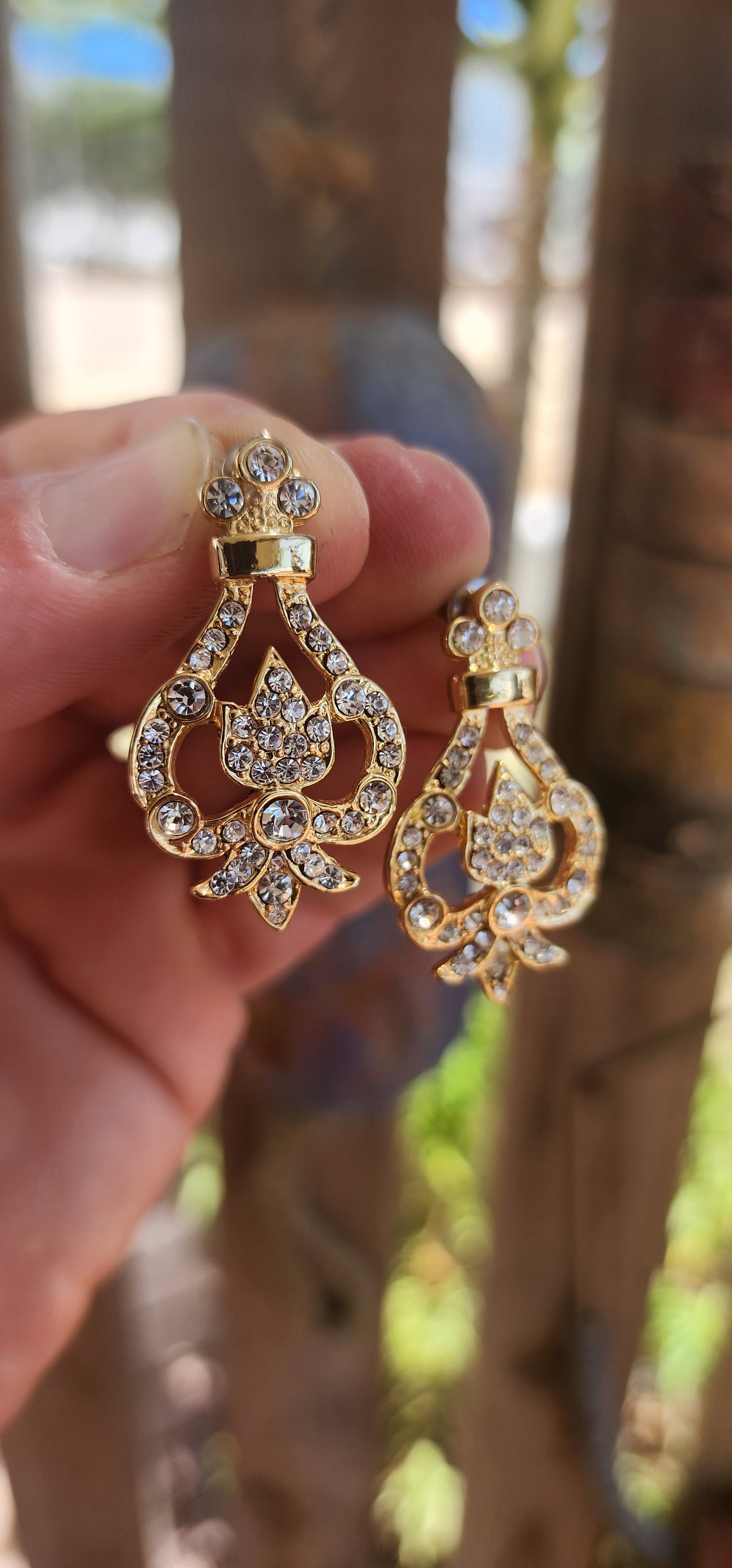 A beautiful pair of vintage costume designer earrings by Dick & Co., known for producing elegant, high-quality costume jewellery pieces with a strong focus on sparkle and m design.