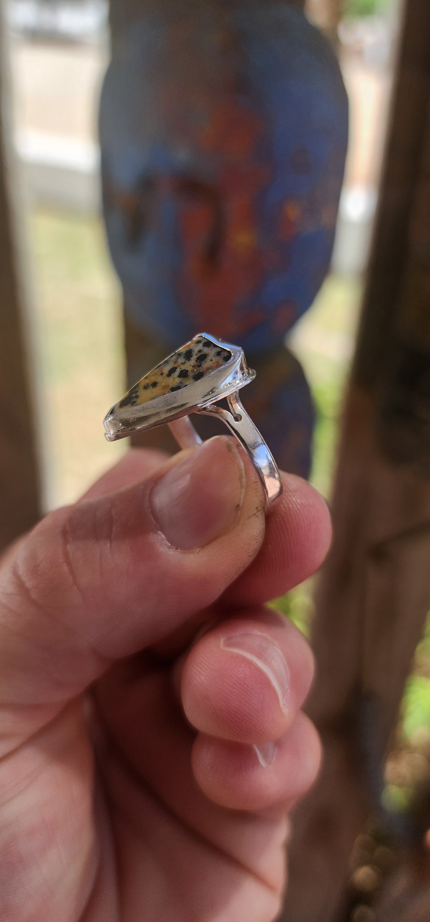 A striking artisan-made sterling silver dress ring, designed around a beautifully irregular, organically shaped Dalmatian Jasper cabochon.