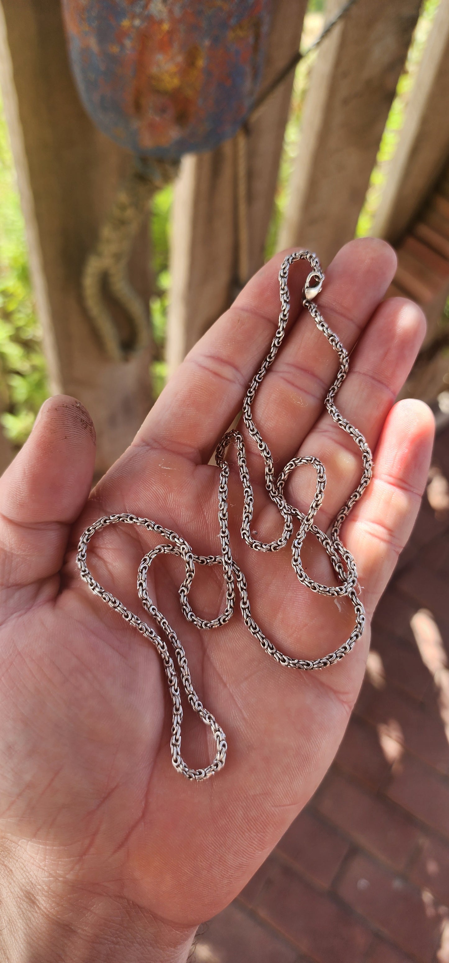 A marvelous vintage, extra-length solid sterling silver chain crafted in the intricate King’s Byzantine link, one of the most complex and visually rich chain designs in jewellery history.
