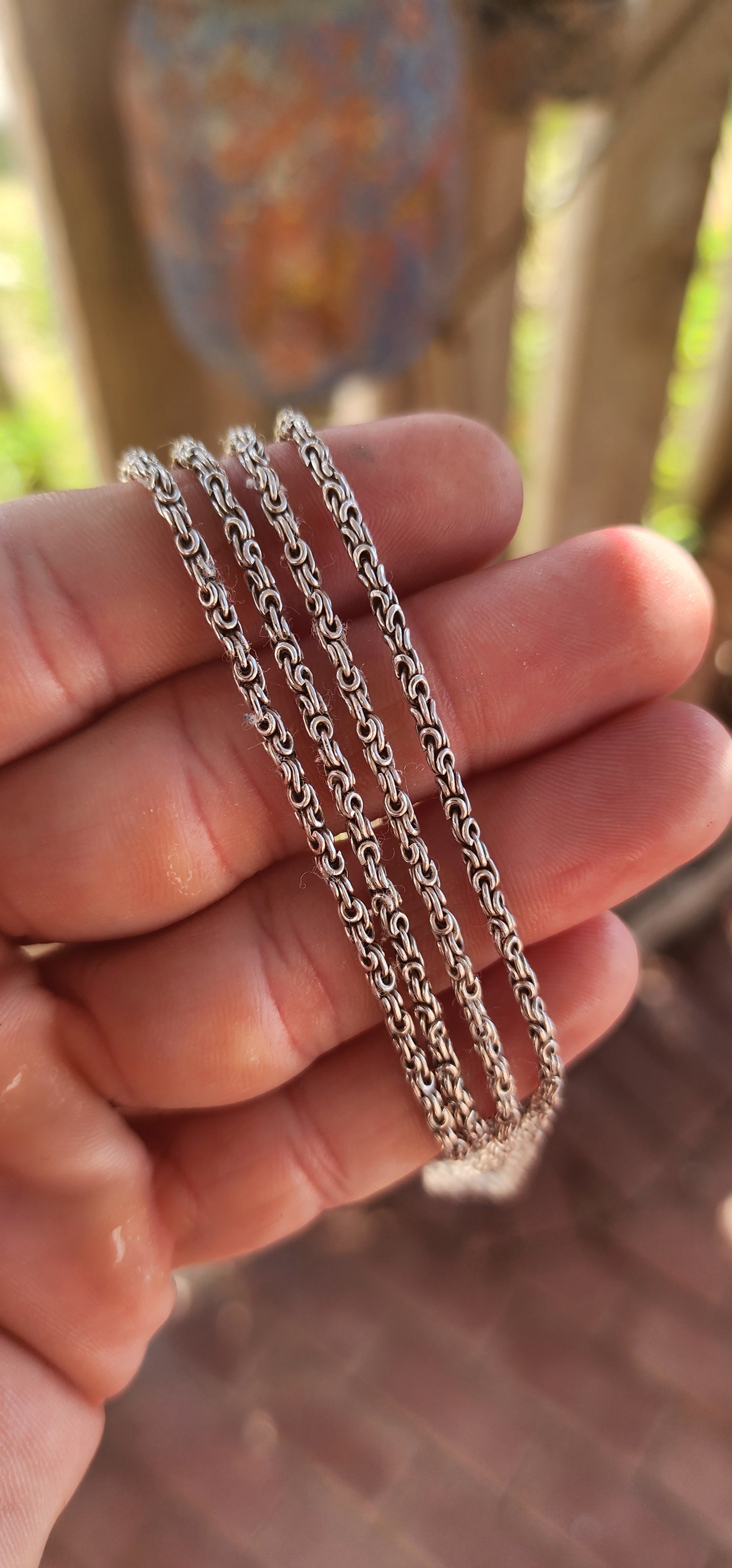 A marvelous vintage, extra-length solid sterling silver chain crafted in the intricate King’s Byzantine link, one of the most complex and visually rich chain designs in jewellery history.