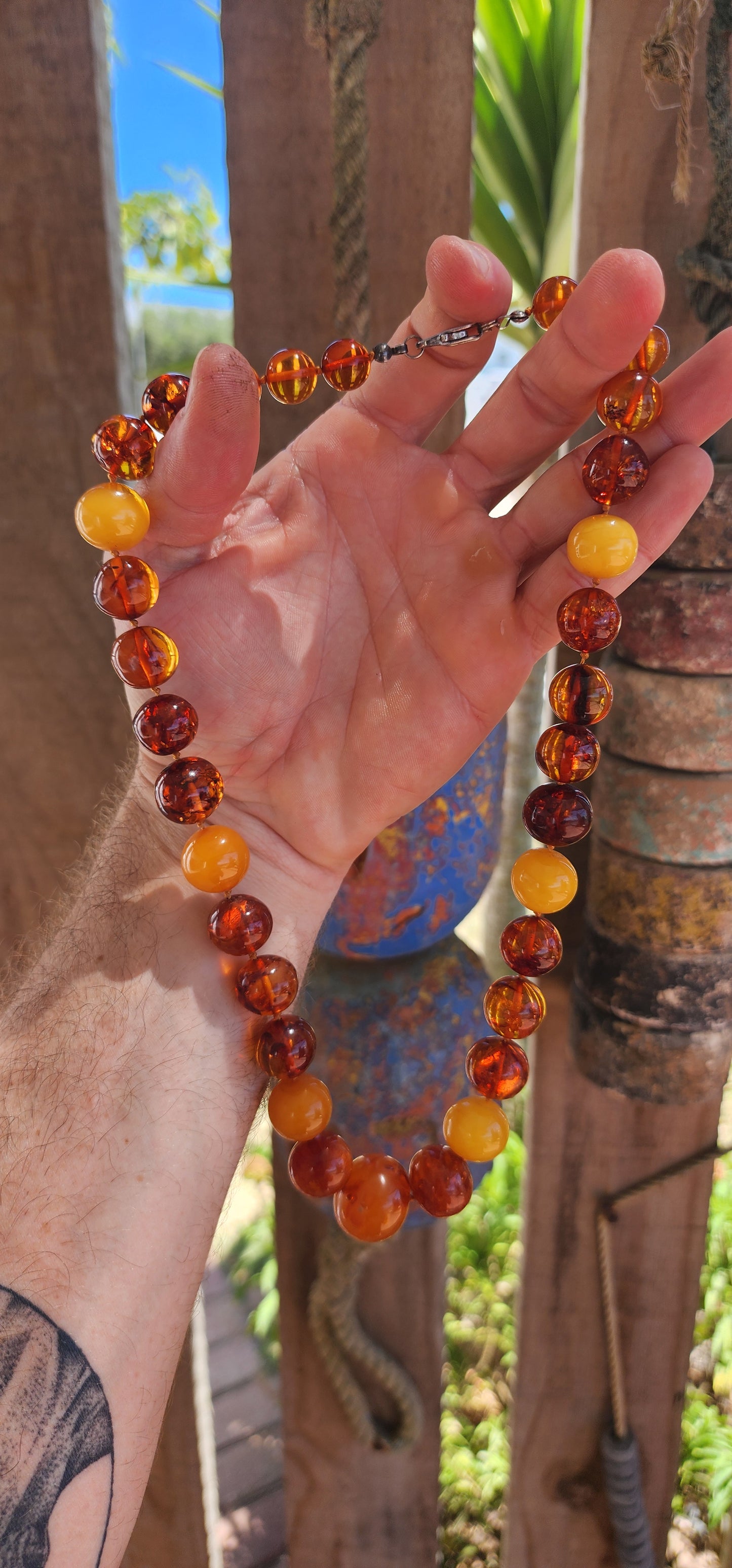 This is a proper, old-soul natural Baltic amber necklace with that rich, glowing, prehistoric energy.