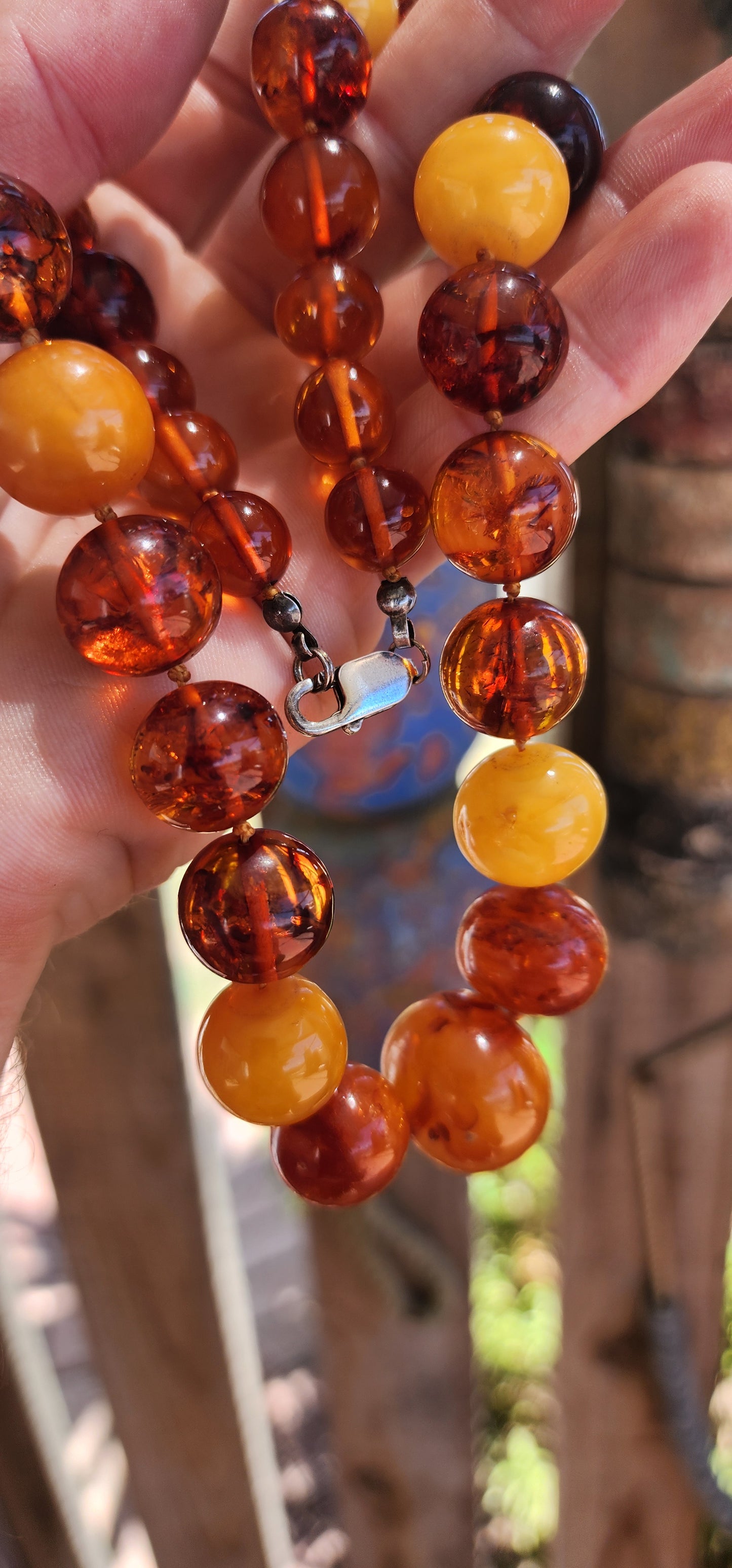 This is a proper, old-soul natural Baltic amber necklace with that rich, glowing, prehistoric energy.