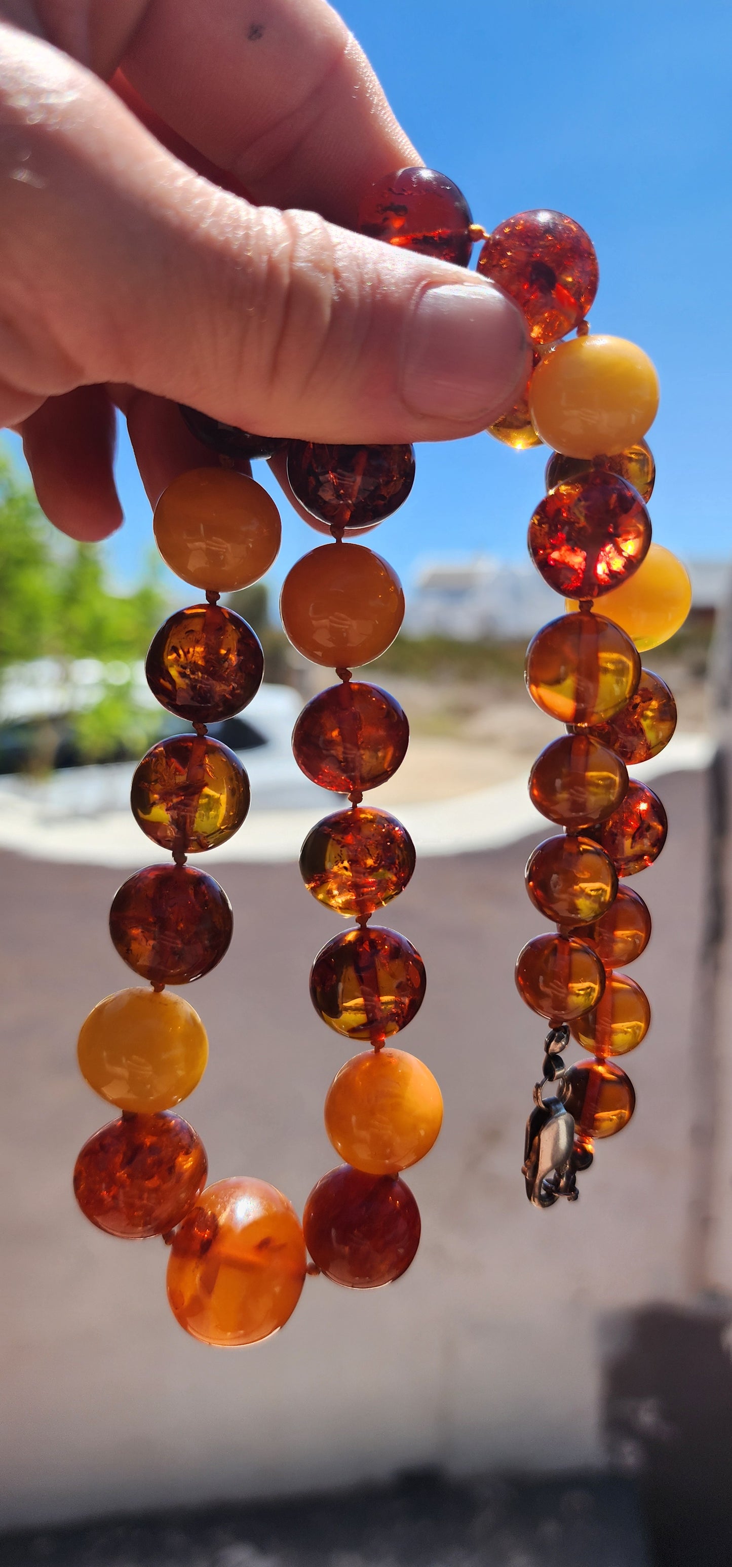 This is a proper, old-soul natural Baltic amber necklace with that rich, glowing, prehistoric energy.