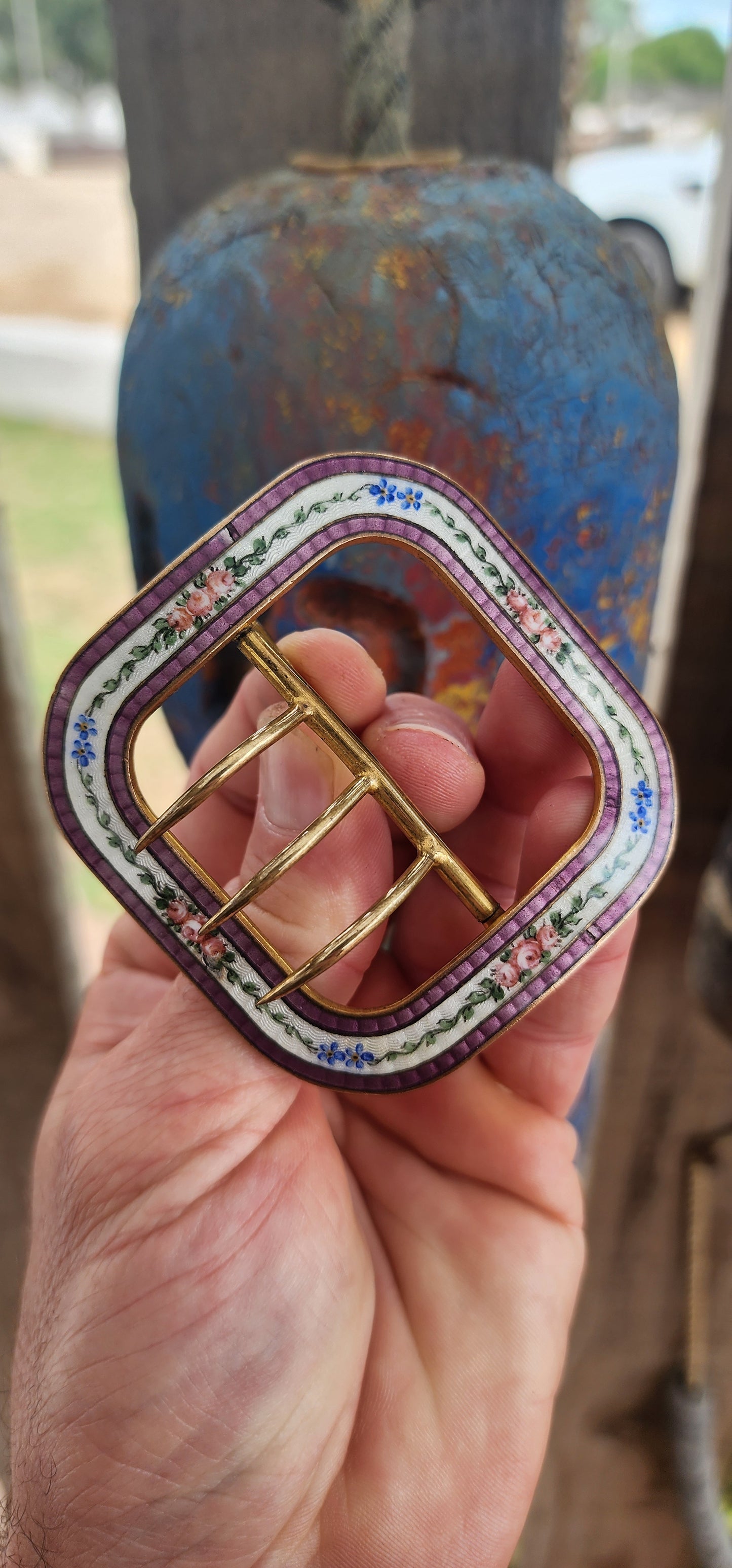 This stunning Art Deco era belt buckle, dating to around the 1920s, is a beautiful blend of craftsmanship and decorative artistry.