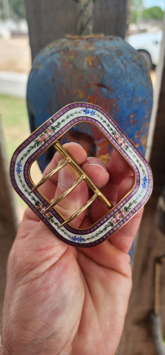 This stunning Art Deco era belt buckle, dating to around the 1920s, is a beautiful blend of craftsmanship and decorative artistry.