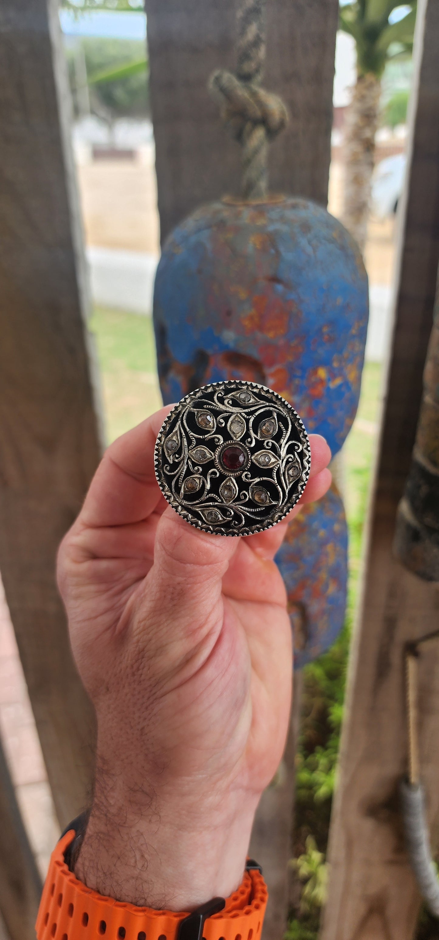This extraordinary round brooch is crafted in 800-grade silver and represents traditional Javanese / Indonesian silversmithing, dating to the late Victorian period (late 1800s)