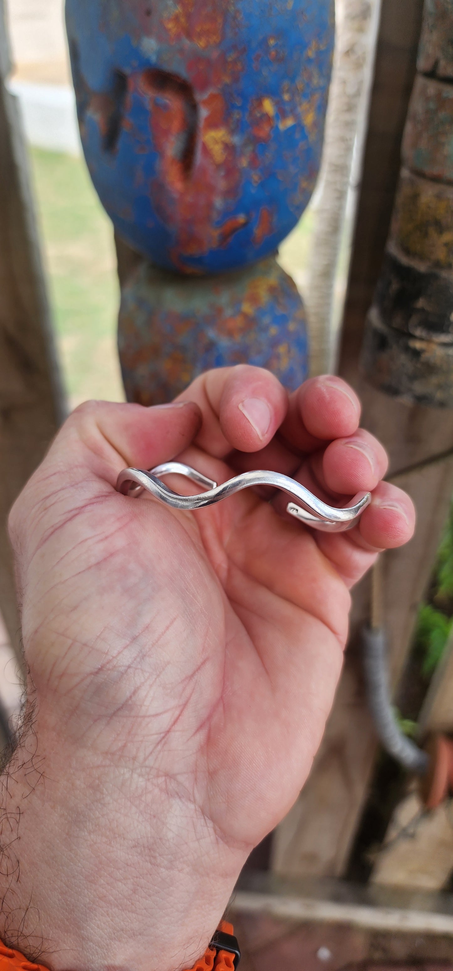 This striking solid sterling silver cuff is all about clean lines and fluid movement.