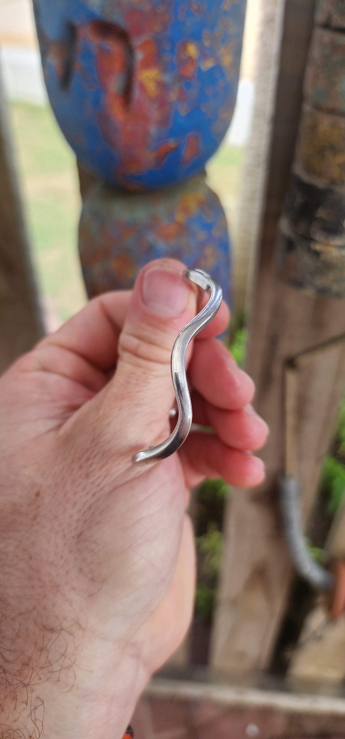 This striking solid sterling silver cuff is all about clean lines and fluid movement.