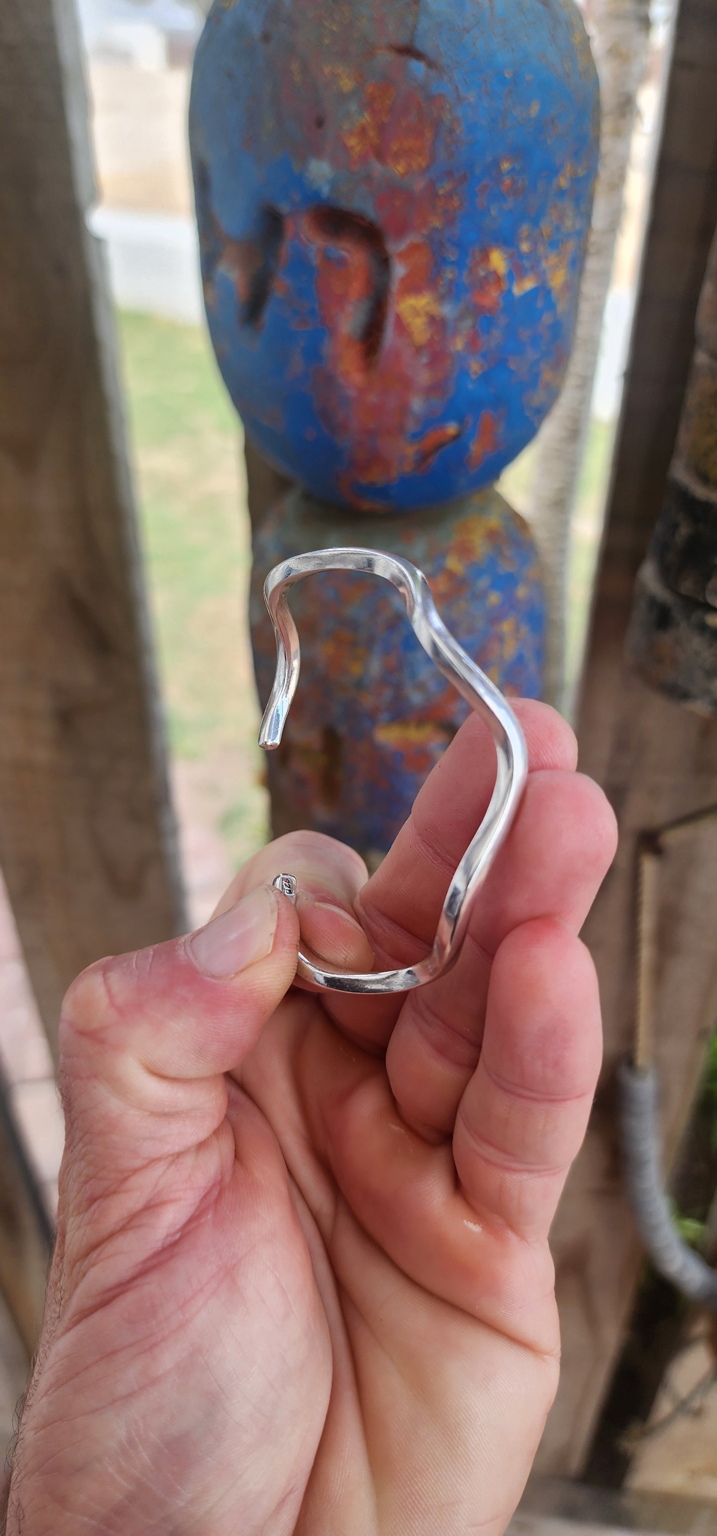 This striking solid sterling silver cuff is all about clean lines and fluid movement.