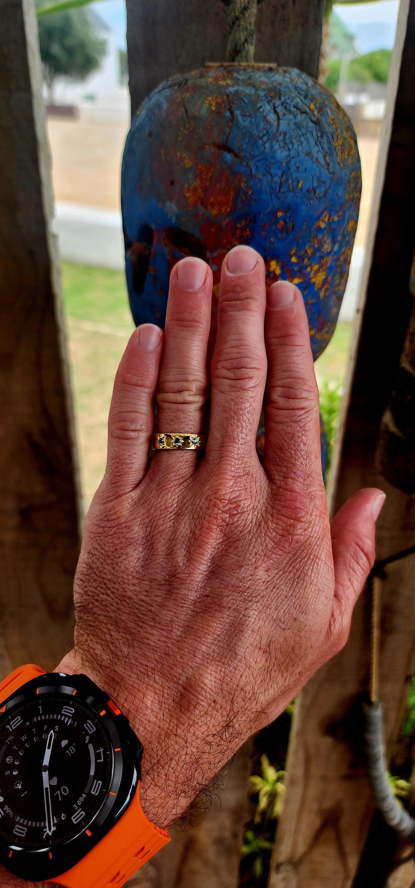 Crafted in solid sterling silver and luxuriously finished in rich 18ct yellow gold plating, this unisex gypsy-style band carries a presence that doesn’t ask for attention — it commands it.
