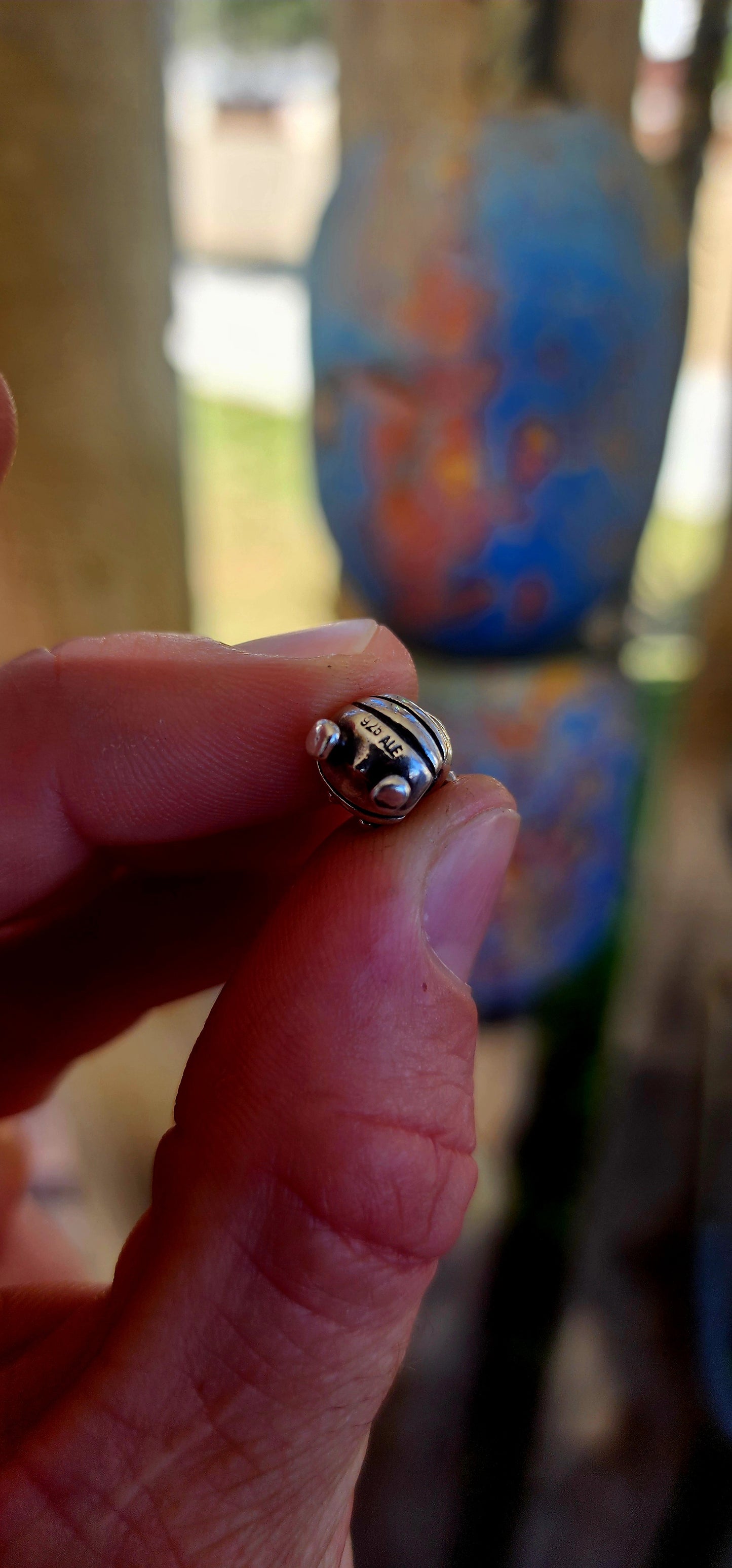 This retired P-a-n-d-o-r-a charm features the most charming little queen bee — crafted in solid sterling silver with a genuine 14ct yellow gold crown perched proudly on her head.