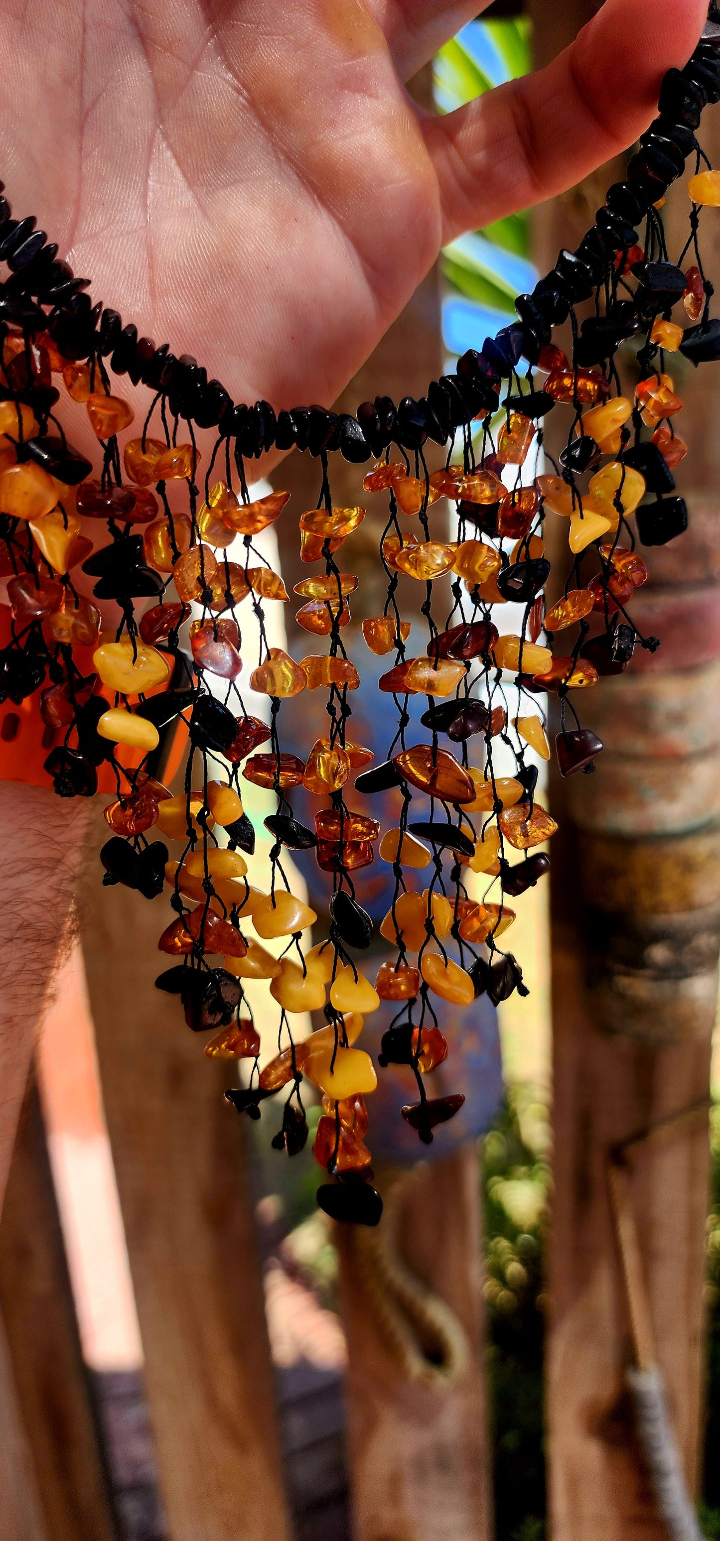 Handmade and gloriously bold, this chunky statement piece is crafted from natural Baltic amber chips.