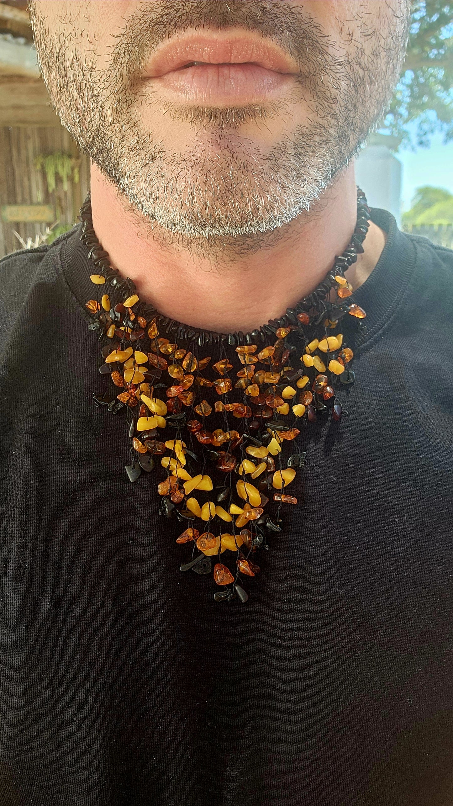 Handmade and gloriously bold, this chunky statement piece is crafted from natural Baltic amber chips.