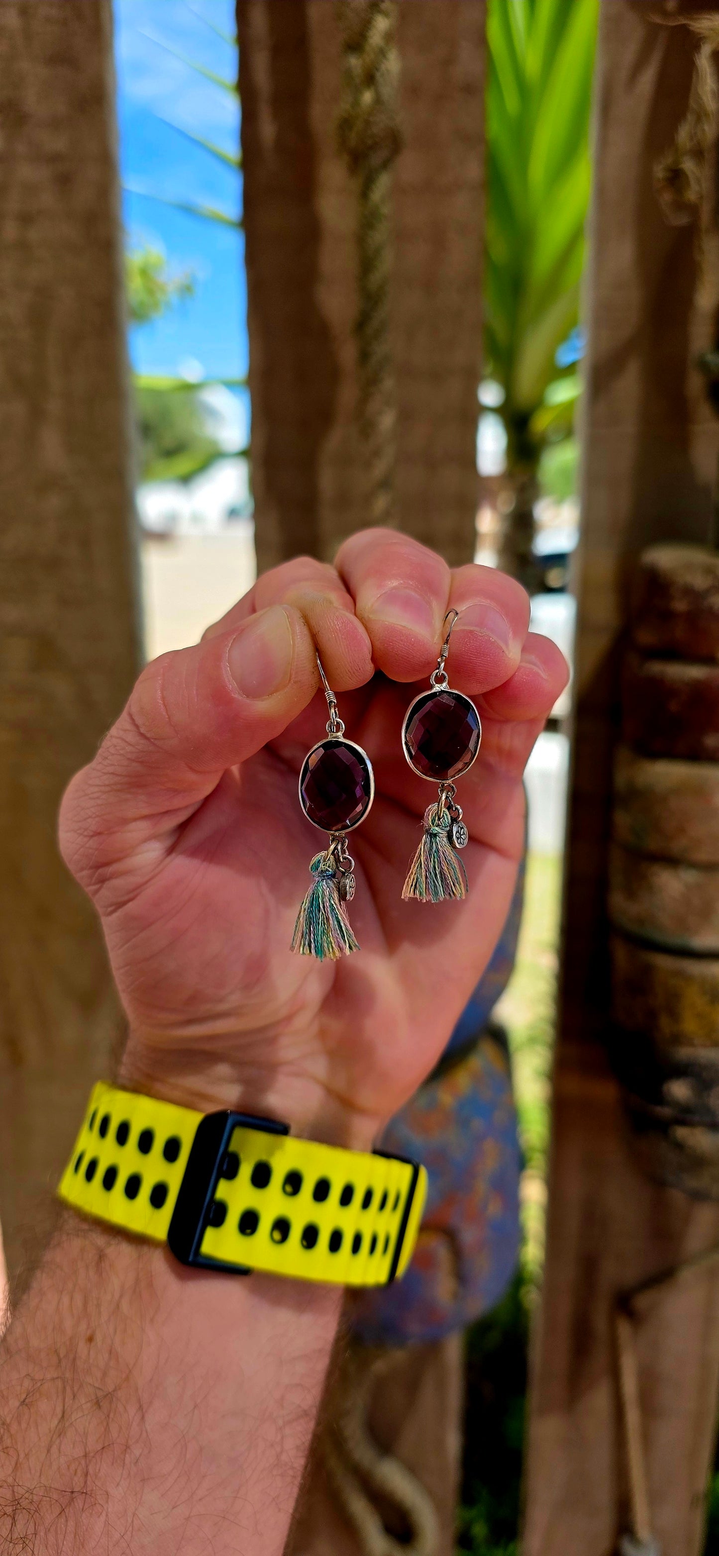 This beautiful bohemian pair is crafted in sterling silver and features oval faceted amethyst gemstones, securely tube-set in smooth silver frame.