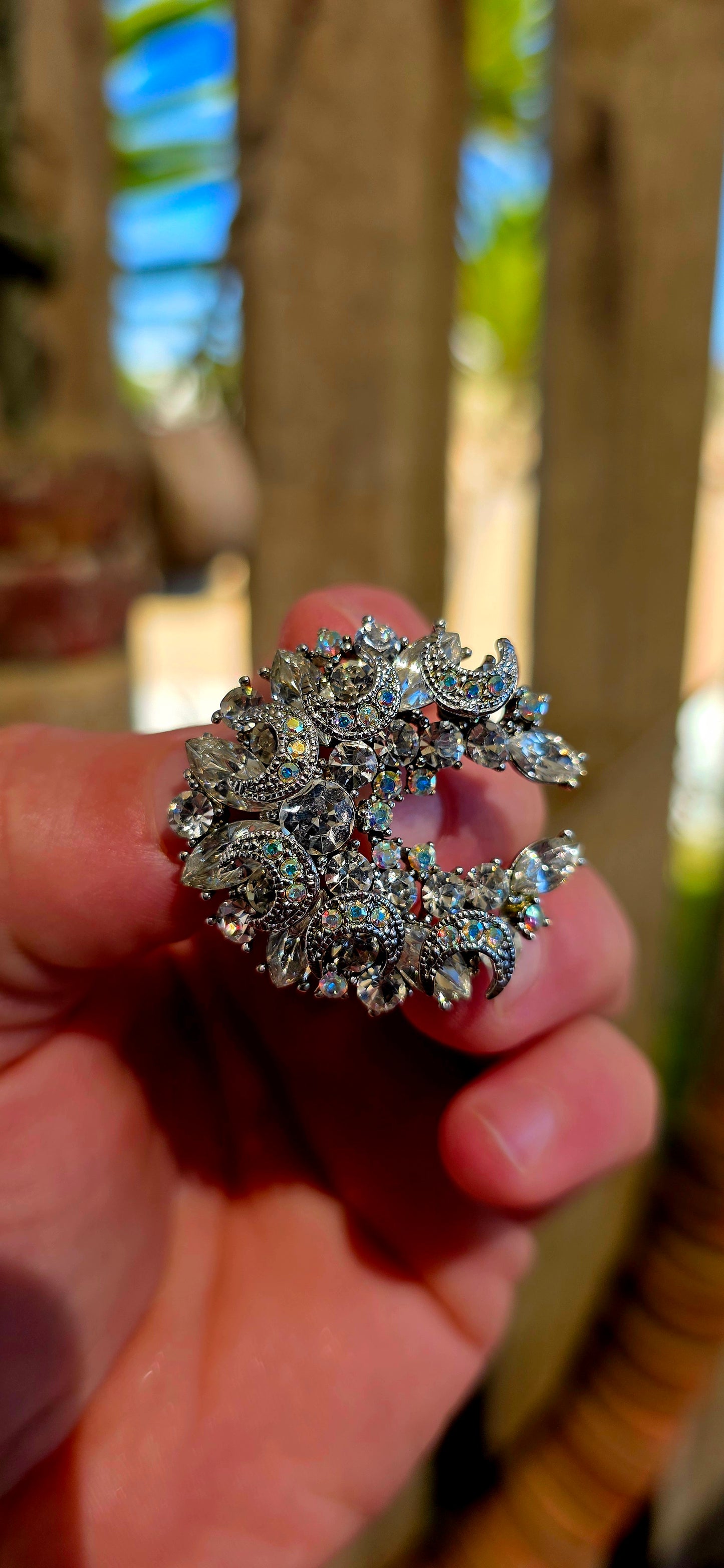 This beautiful vintage costume brooch is crafted in cool-toned silvertone metal and designed in the enchanting shape of a crescent moon, a symbol long associated with mystery, intuition, and feminine energy.