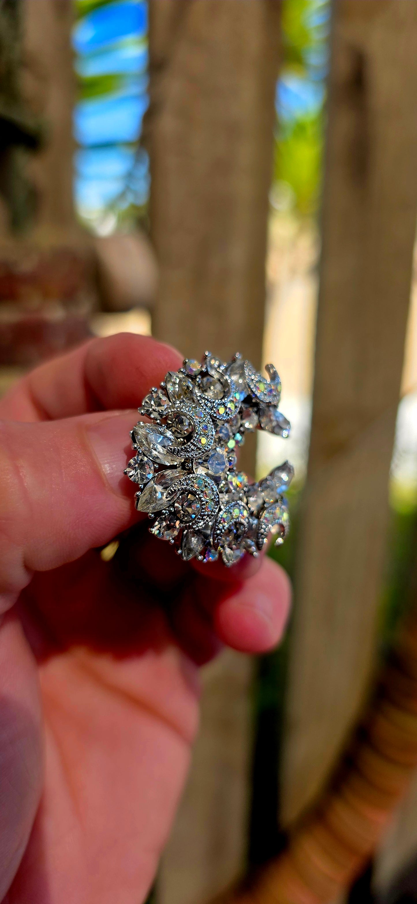 This beautiful vintage costume brooch is crafted in cool-toned silvertone metal and designed in the enchanting shape of a crescent moon, a symbol long associated with mystery, intuition, and feminine energy.