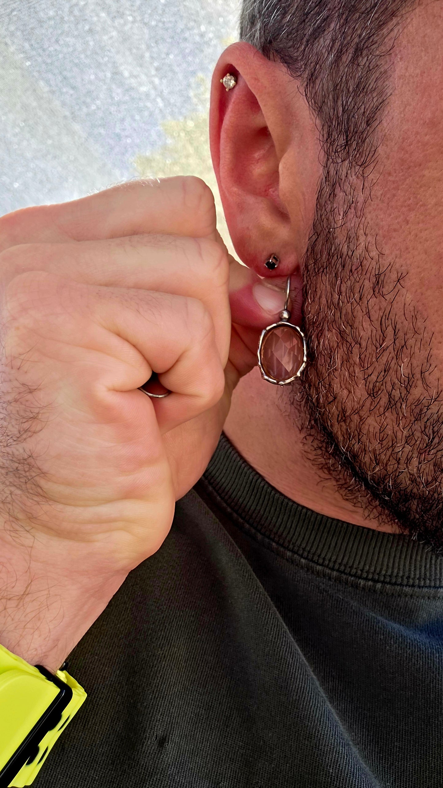 These beautiful artisan-made designer earrings are crafted in sterling silver and feature luminous faceted oval-cut strawberry quartz gemstones in a warm, soft rose hue.