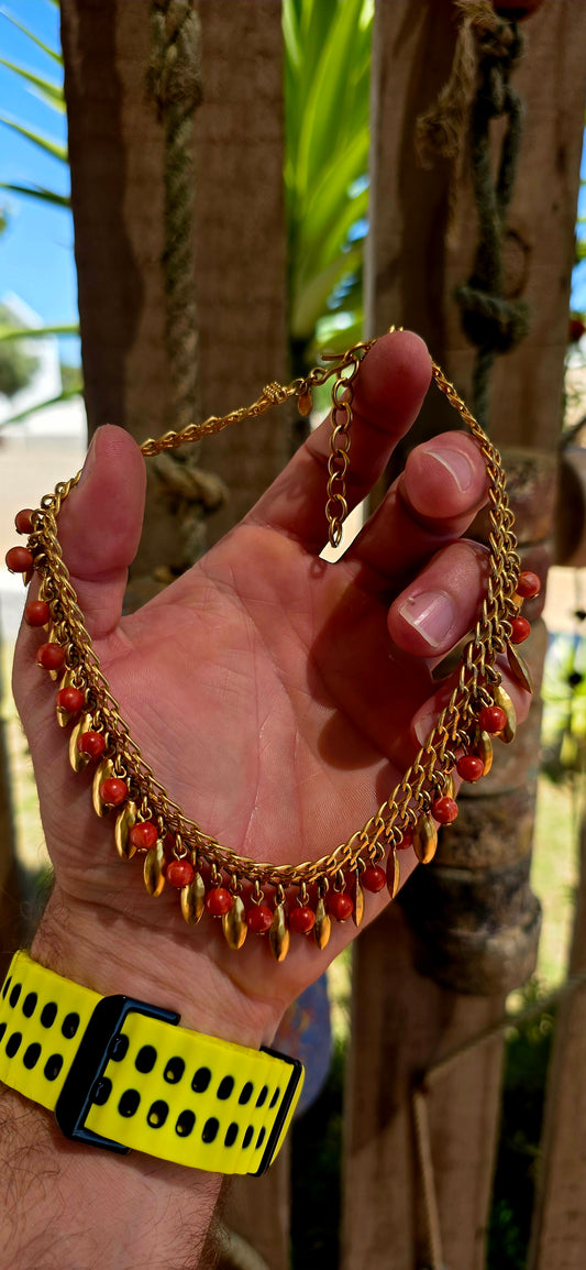 This marvelous vintage designer collar necklace was created by the renowned American costume jewellery house Monet and dates to the 1980s, a decade known for bold statement jewellery and rich, globally inspired design.