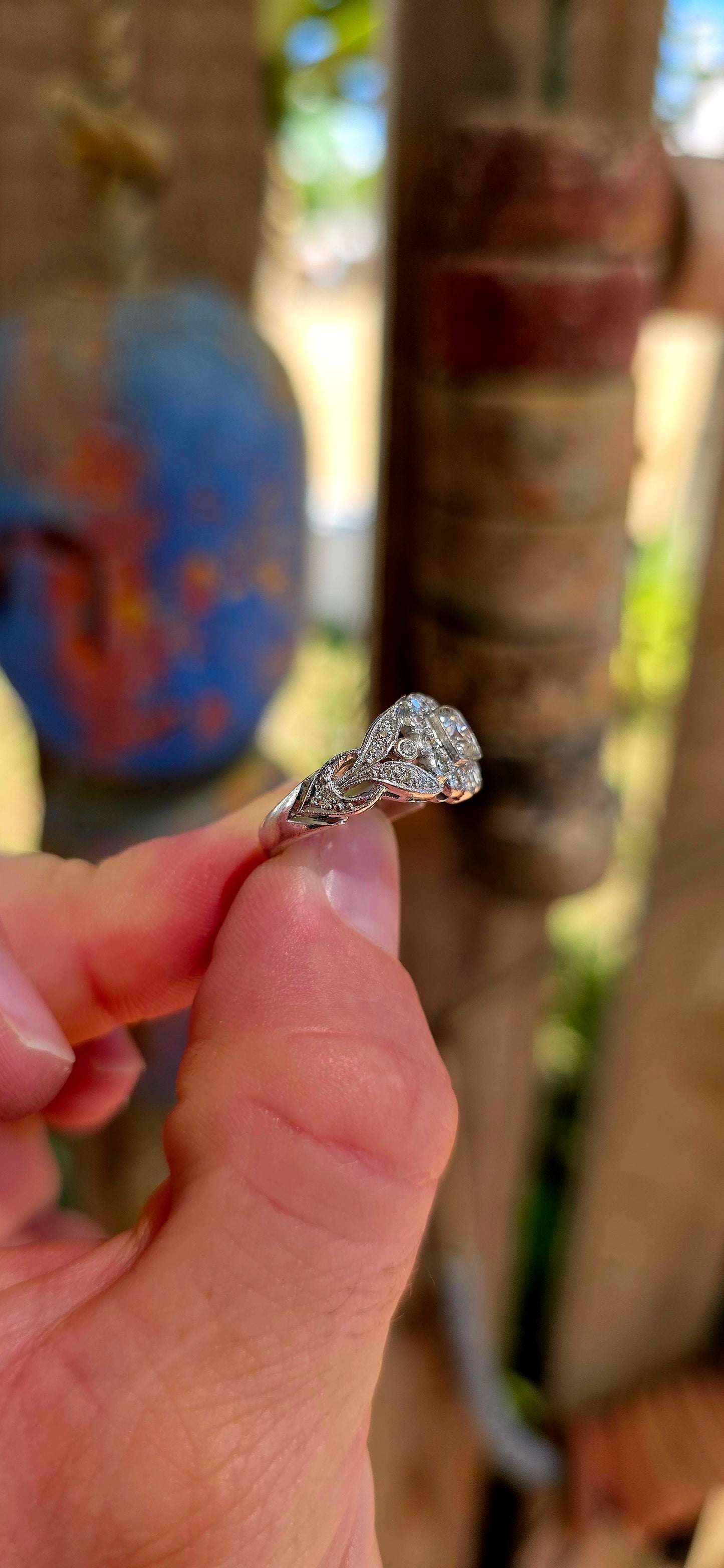 A truly breathtaking example of Art Deco-era elegance, this magnificent antique ring is crafted in solid 18ct white gold and set with an array of ultra-sparkly brilliant white diamonds that capture the light from every angle