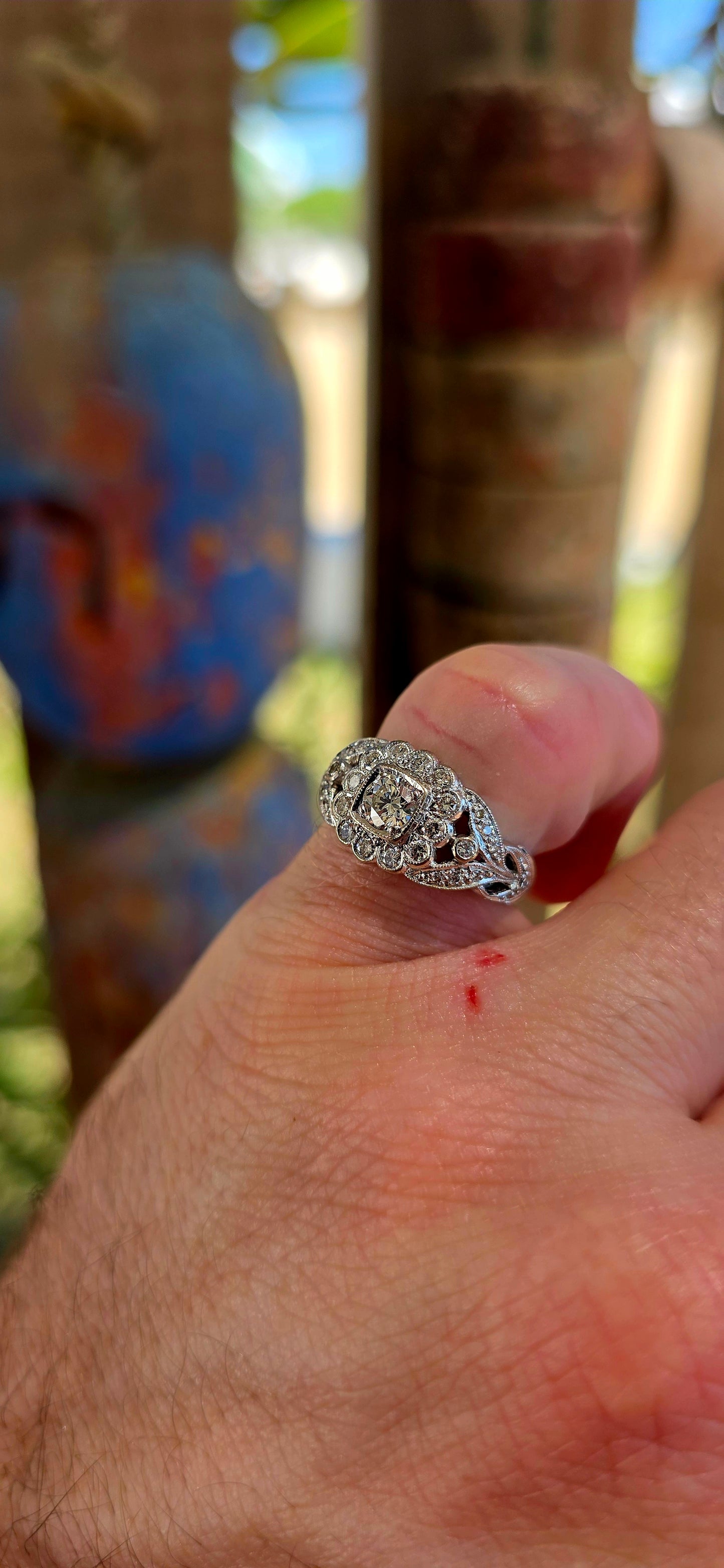 A truly breathtaking example of Art Deco-era elegance, this magnificent antique ring is crafted in solid 18ct white gold and set with an array of ultra-sparkly brilliant white diamonds that capture the light from every angle