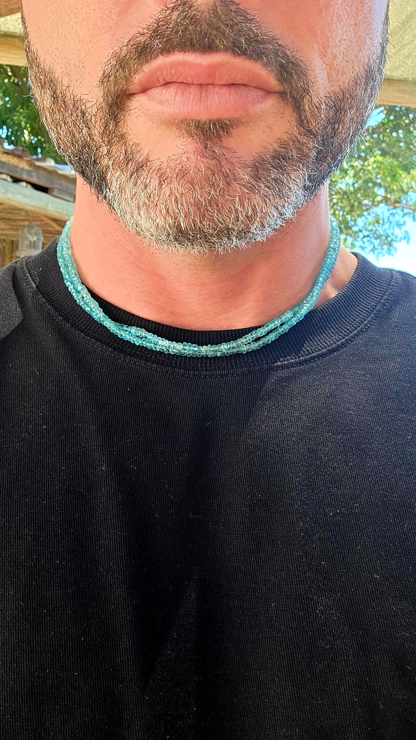 This beautiful necklace is crafted from two strands of faceted blue apatite gemstone beads, each bead cut into tiny rondelles that catch the light with a subtle sparkle.