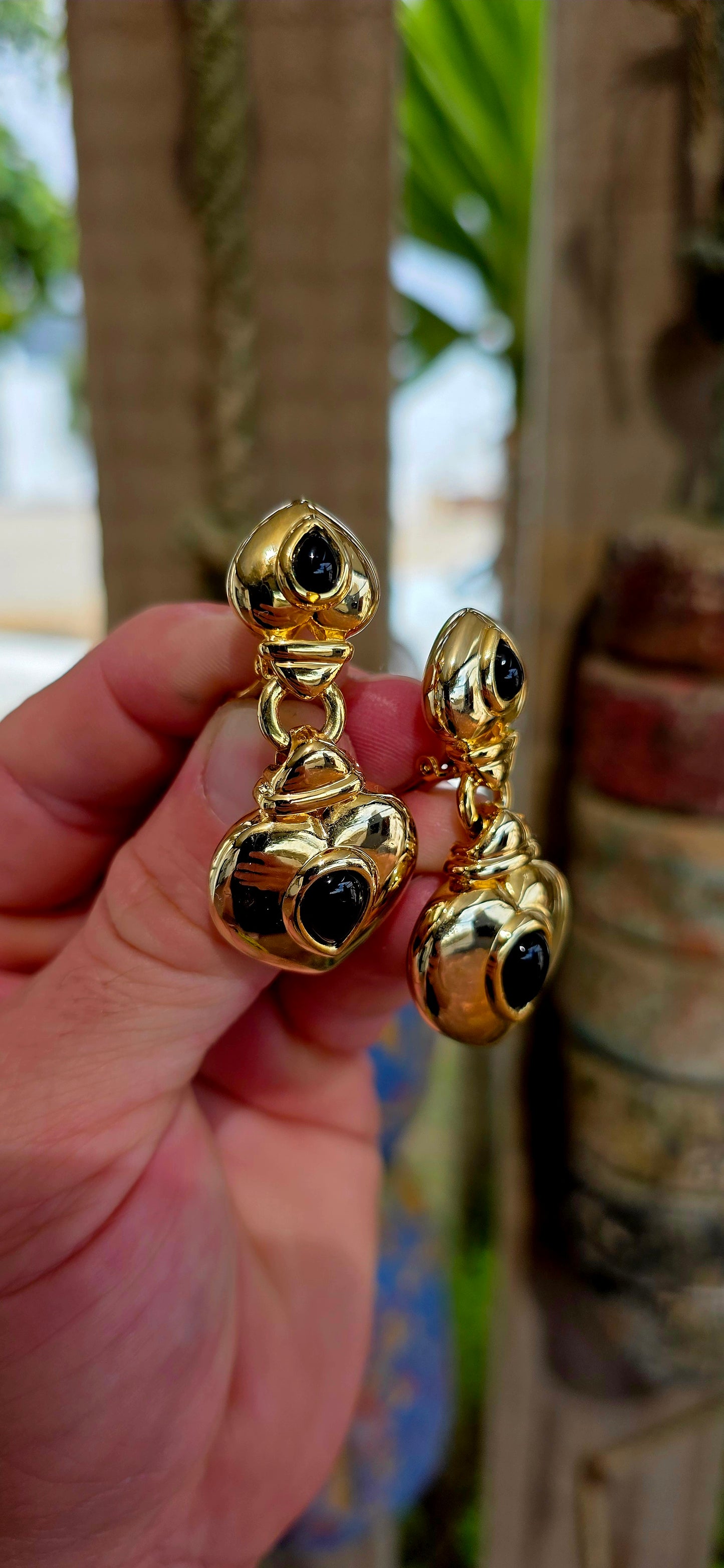 This large and striking pair of vintage 1990’s clip-on earrings captures that unmistakable bold statement style that defined late-20th-century fashion jewellery.